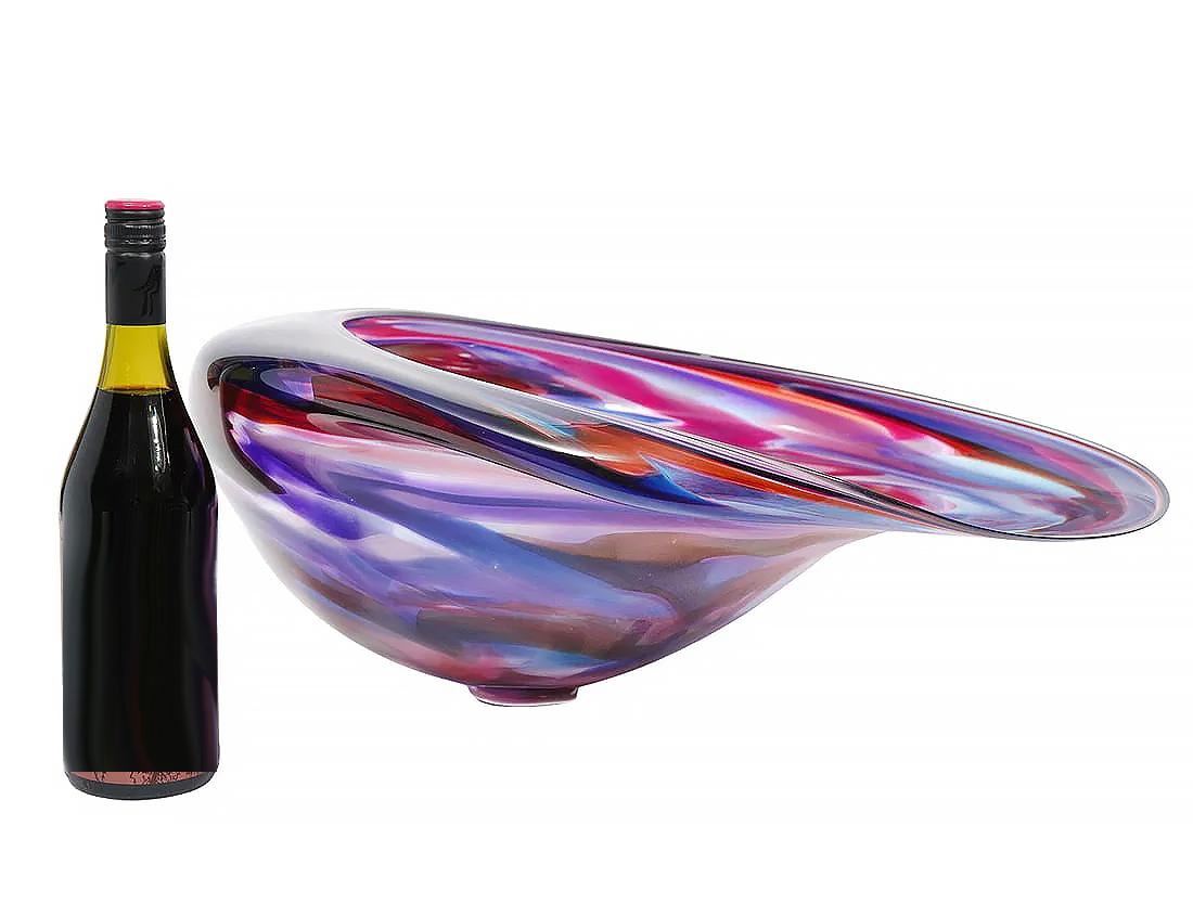 

Monumental David Goldhagen Blown Art Glass Centerpiece Bowl

Offered for sale is a monumentally scaled hand-blown free-form crystal centerpiece by David Goldhagen, (American, Born 1957). This large blown glass sculptural dish features a