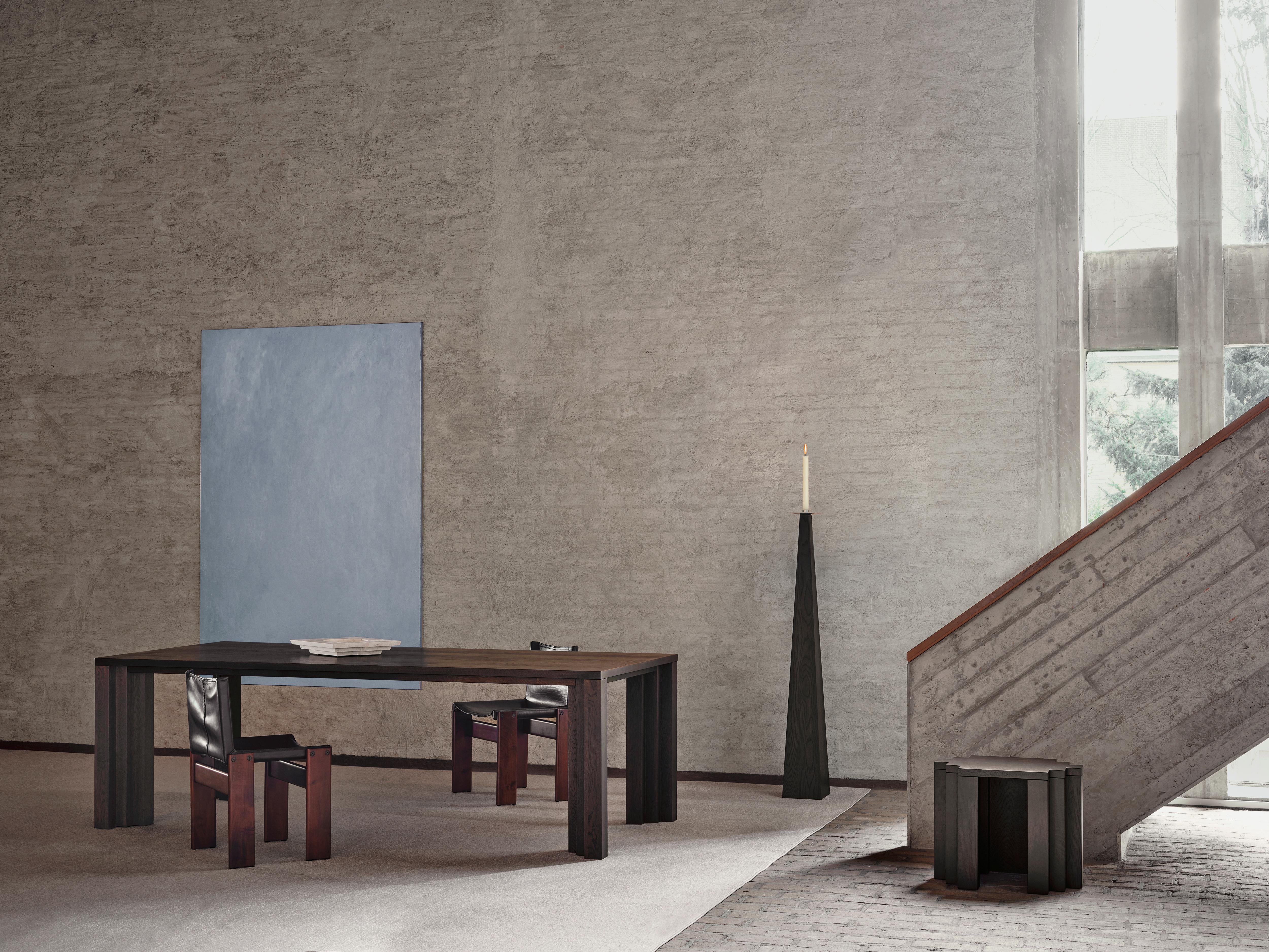 The Cadence table is inspired by the simplicity and power of the rhythmic stepped brickwork visible in the architecture of Amsterdam's 'South Plan' area; the city development plan designed by H.P. Berlage in 1915. A flow of rhythmic volumes and