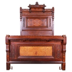 Monumental Eastlake Victorian Carved Walnut and Burl Wood Bed, circa 1870