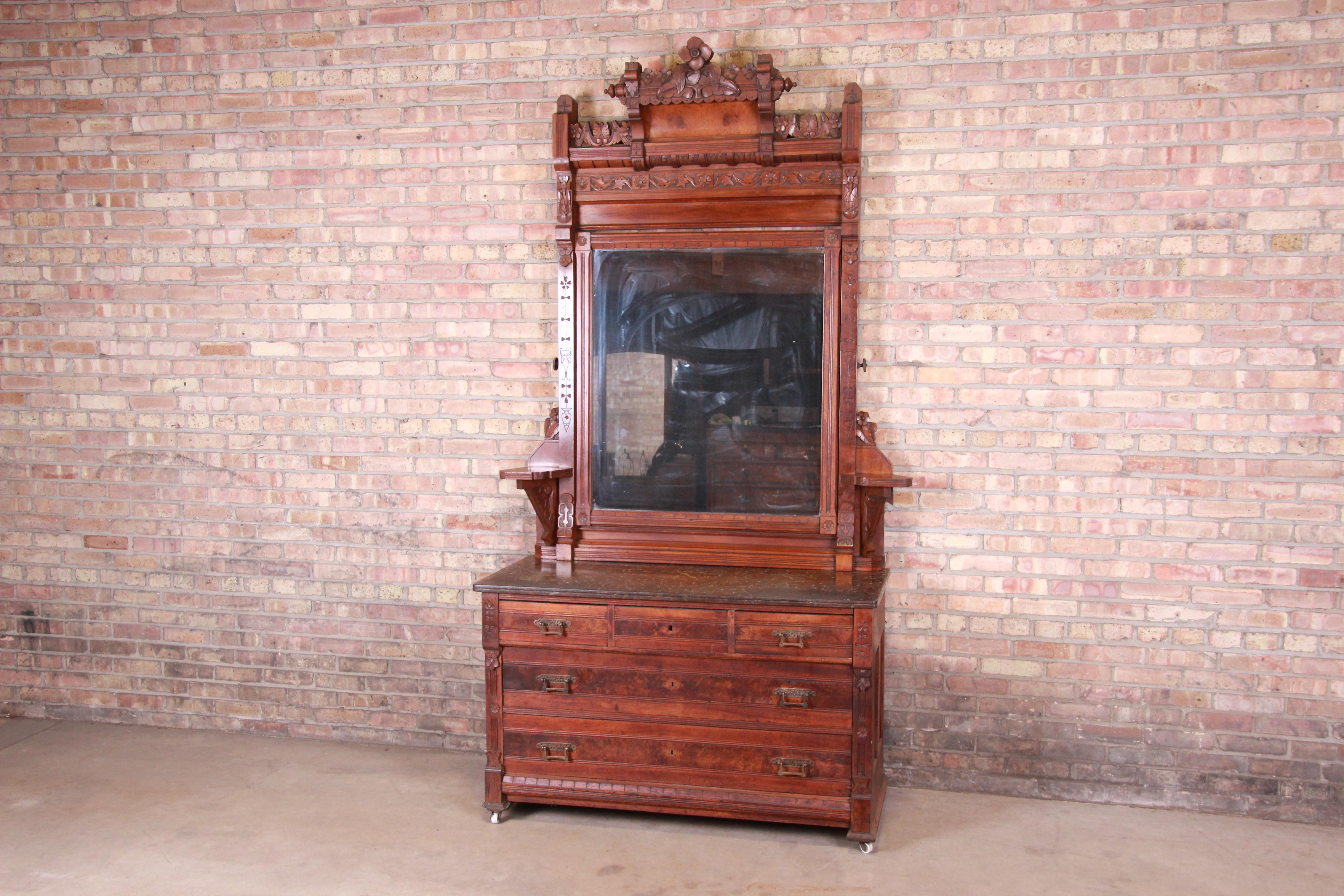 American Monumental Eastlake Victorian Carved Walnut and Burl Wood Dresser with Mirror