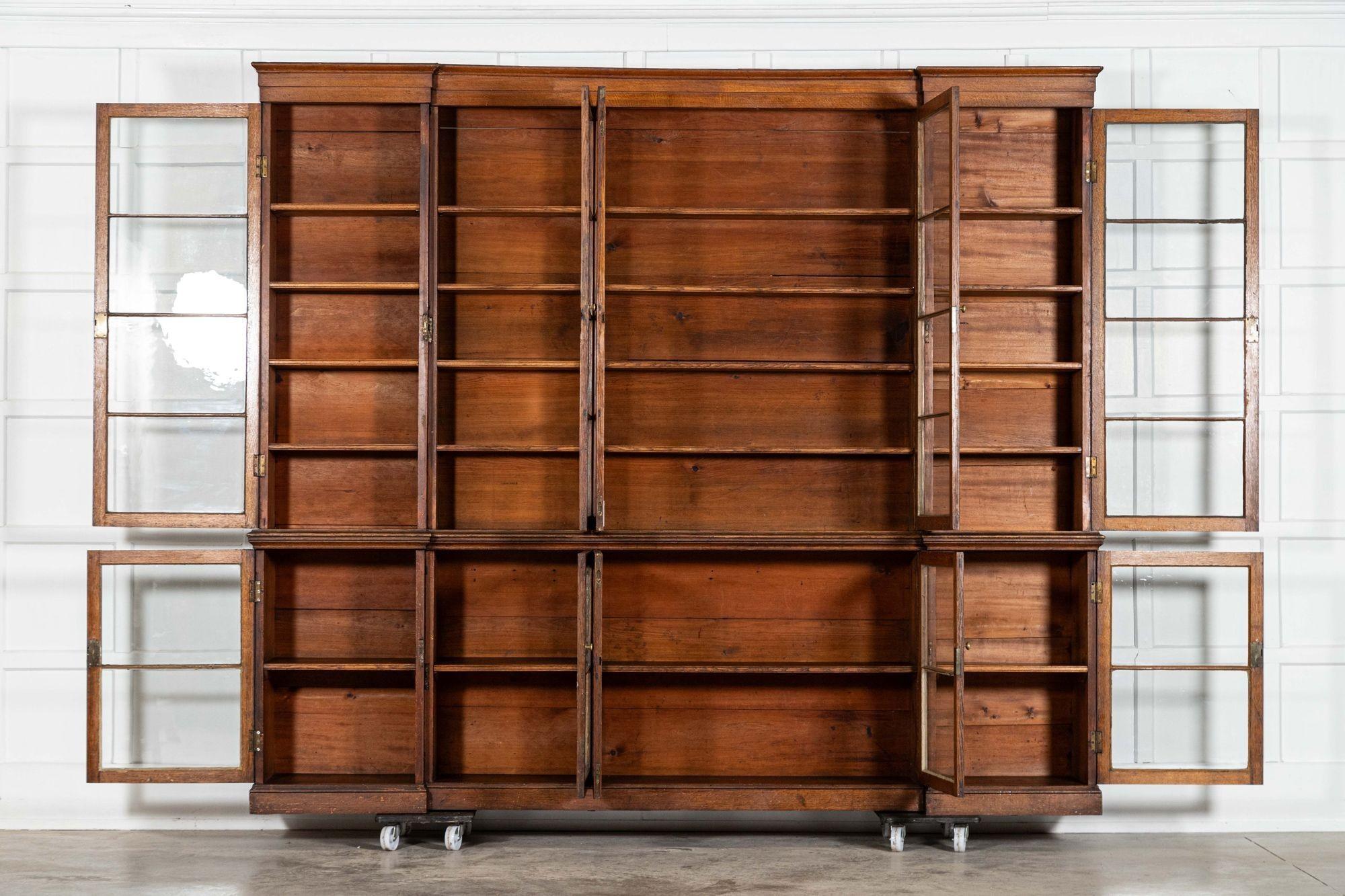 circa 1870
sku 2050
Monumental English 19thC Oak Breakfront Glazed Bookcase

Adjustable Shelves

Together W258 x D38 x H229 cm
Base W257.5 x D38 x H86 cm
Base right section internal shelf depth 32.5 cm
Base middle section internal shelf depth 27.5