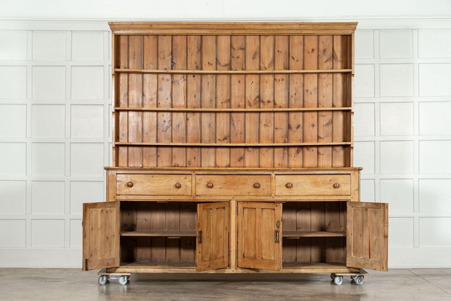 circa 1870
Monumental English 19thC Pine Waterfall Dresser
sku 1815
Base W234 x D57 x H96 cm.
Top W232 x D27 x H135 cm.
Together W234 x D57 x H331 cm.
Weight 180 kg