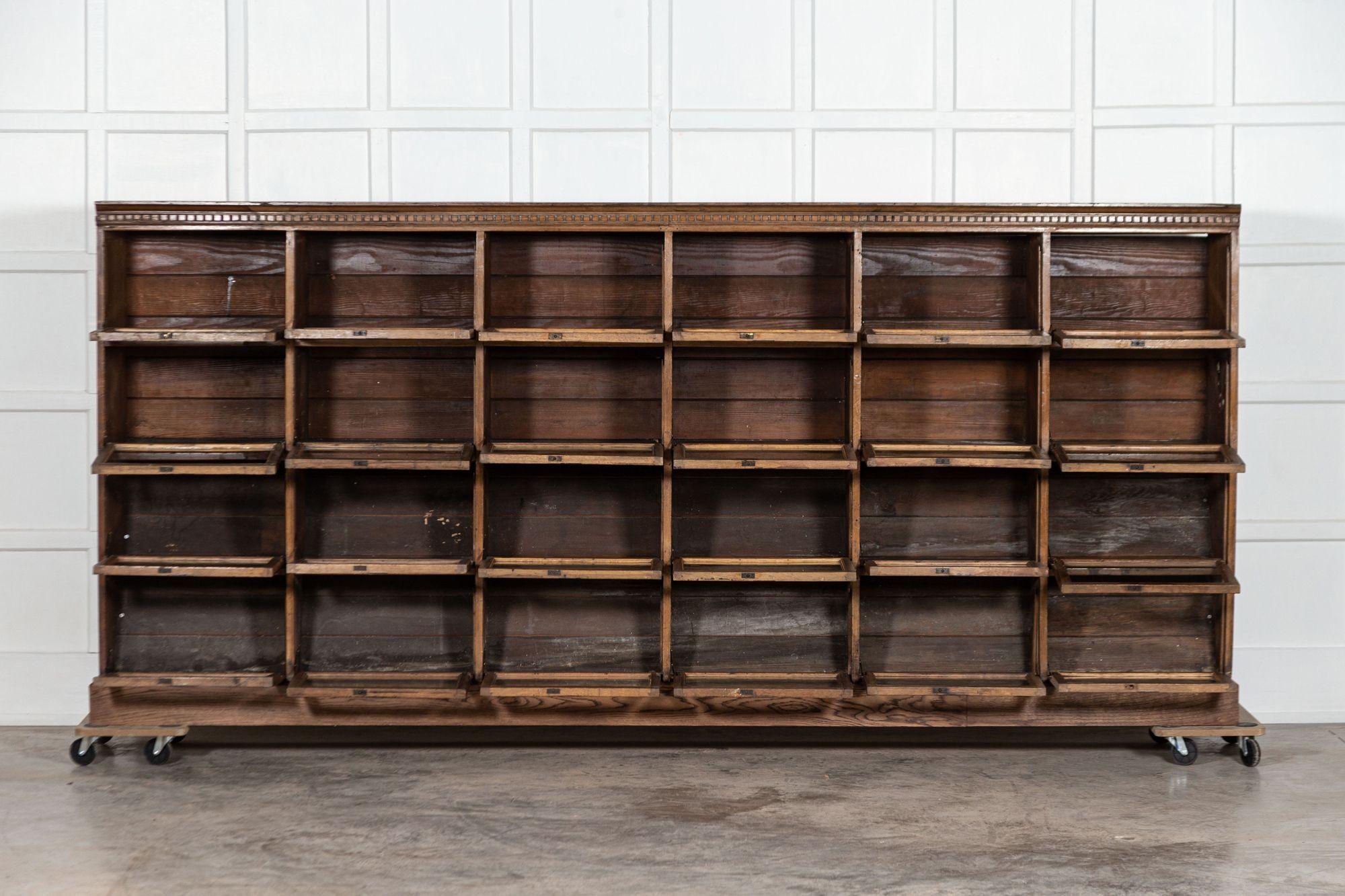 circa 1890
Monumental English Oak Barristers Bookcase Cabinet
sku 1347
W310 x D46 x H141 cm.