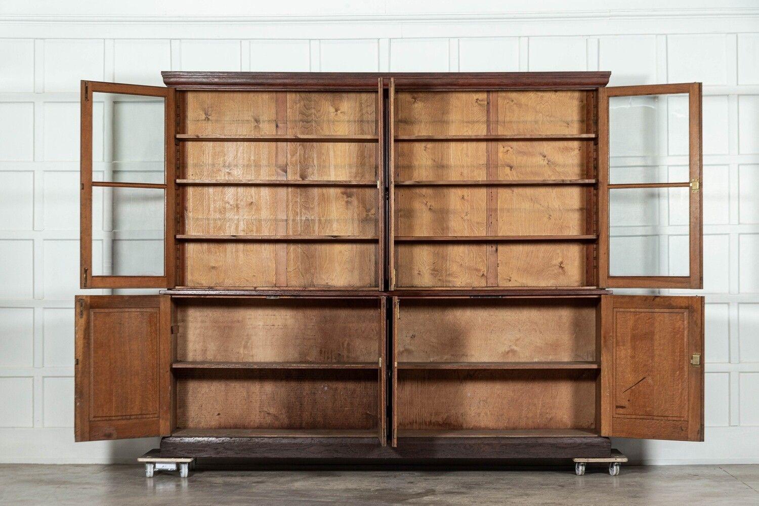 circa 1900
Monumental English Oak Glazed Bookcase
sku 1665
Base W249 x D49 x H92 cm
Top W251 x D34 x H122 cm
Together W251 x D49 x H214 cm