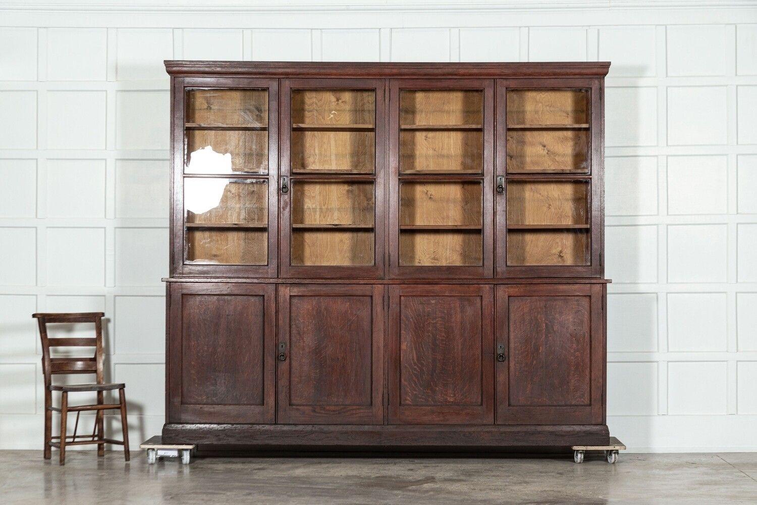 20th Century Monumental English Oak Glazed Bookcase For Sale