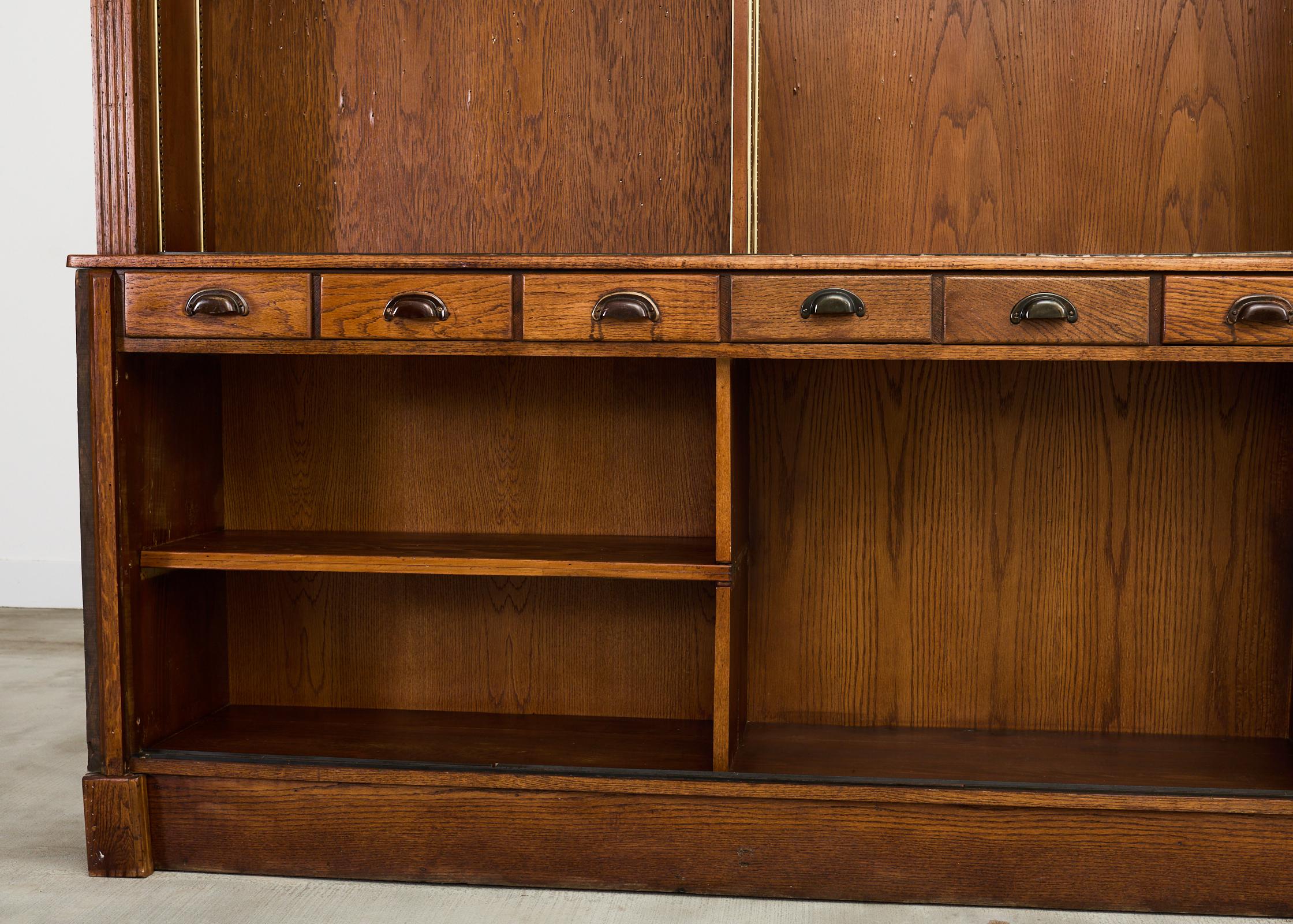 Monumental English Oak Haberdashery Display Bookcase Cabinet 18 ft. 3