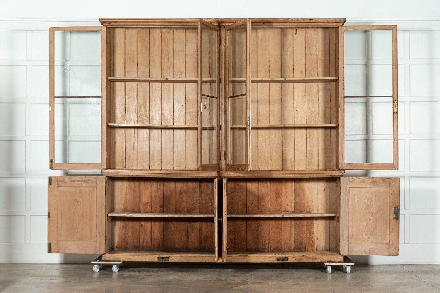 circa 1880
Monumental English Pine Glazed Bookcase Cabinet
sku 1769
Base W243 x D37 x H91 cm.
Top W246 x D37 x H151 cm.
Together W246 x D37 x H242 cm.
Weight 167 kg