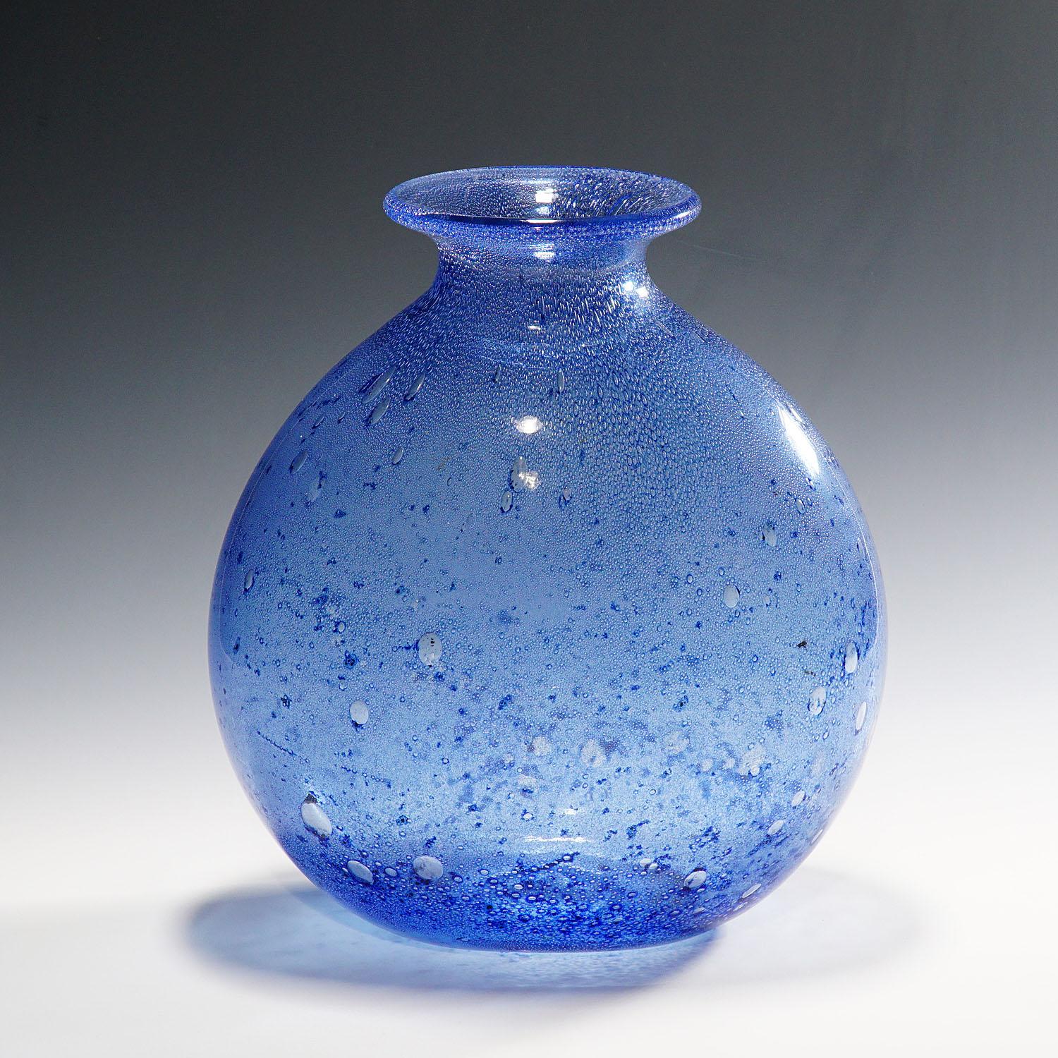 A large blue art glass vase from the 'Efeso' series designed by Ercole Barovier in 1964 for Barovier & Toso, Murano, Italy. Thick glass in bright blue with irregular air inclusions. A very rare example of the famous designs of Ercole Barovier.