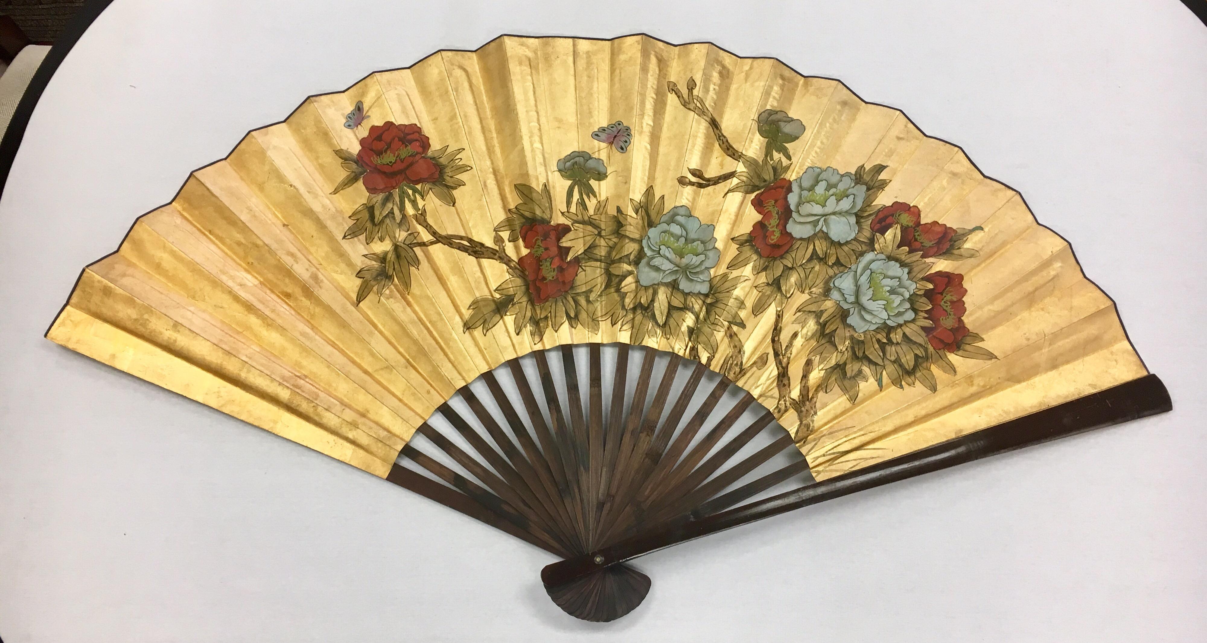 Monumental Chinese folding fan that is extra large when fully opened, circa 1950s
The colors are still incredibly vivid and the folding mechanism works perfectly.
Comes ready to hang on any wall with two hooks in back.
