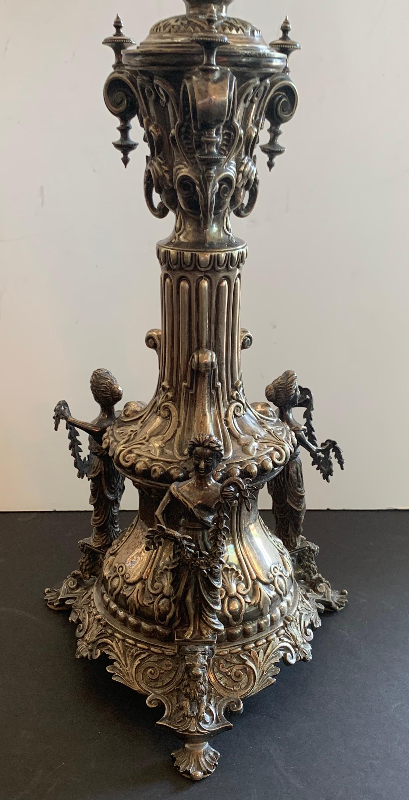 A monumental fine neoclassical / Regency 3 figure English silver plated epergne with 6 candelabra arms
in the manner of Sheffield 31