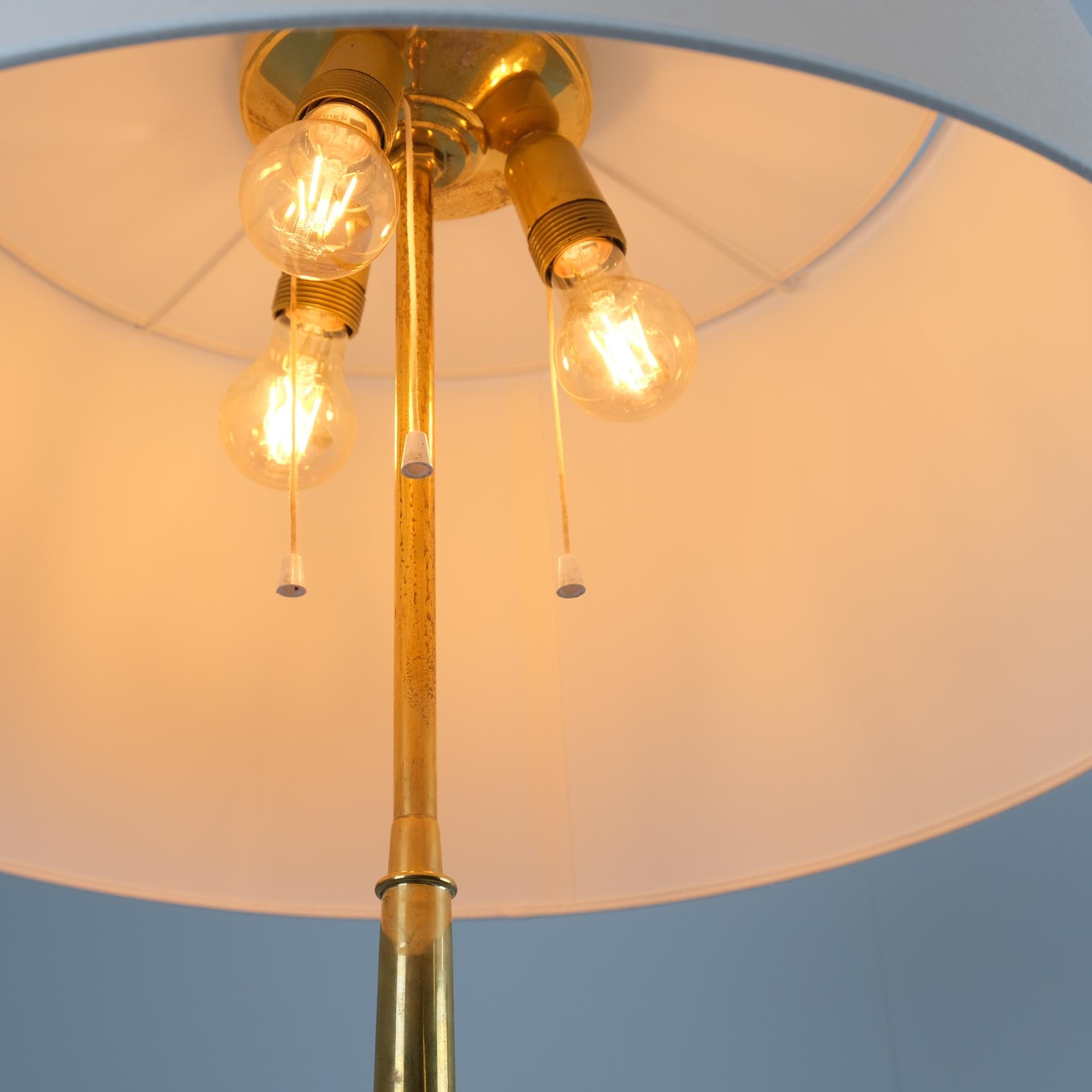 Metal Monumental Floor Lamp Attributed to Paavo Tynell, Brass and Silver Curly Birch For Sale