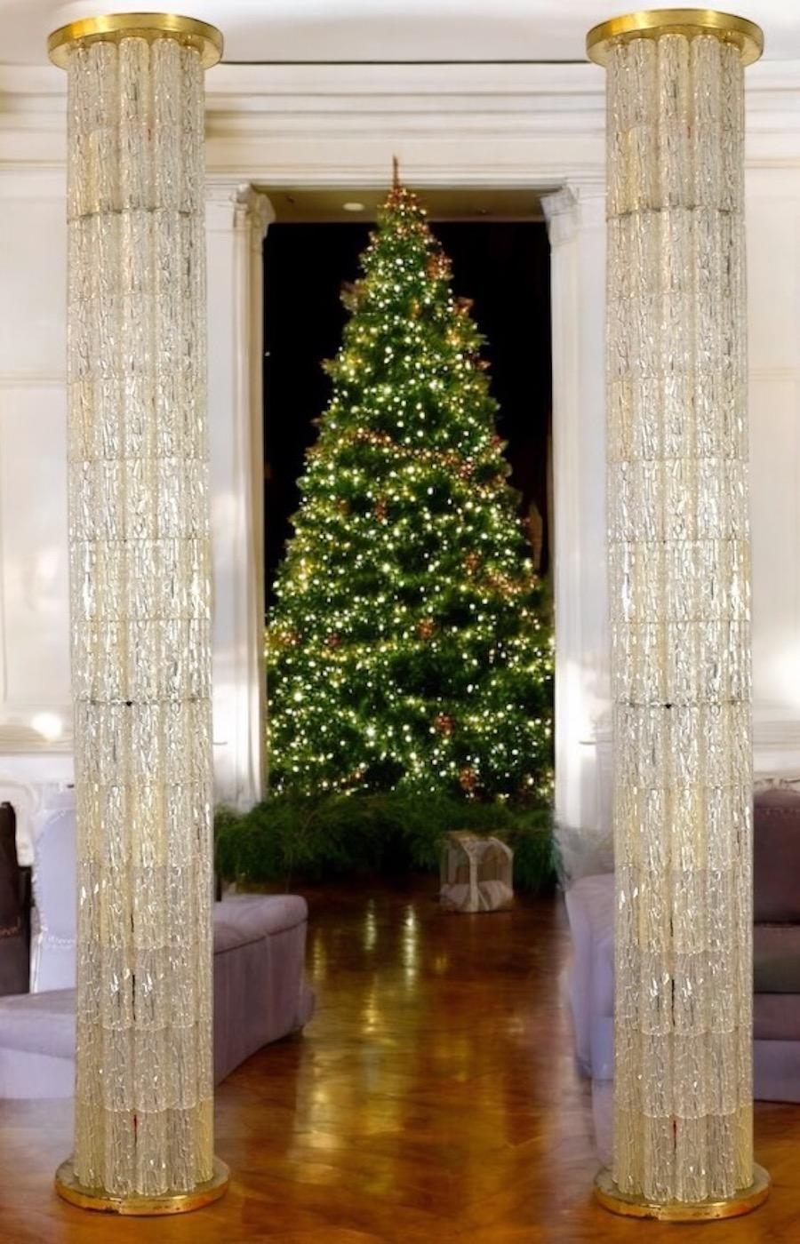 Stunning Tronchi floor lamp Columns,  masterpiece from the 1970s, designed by the renowned JT Kalmar. This elegant lamp features hundreds cylindrical acrylic glass shades, each crafted with an intricate 'ice' structure that beautifully diffuses