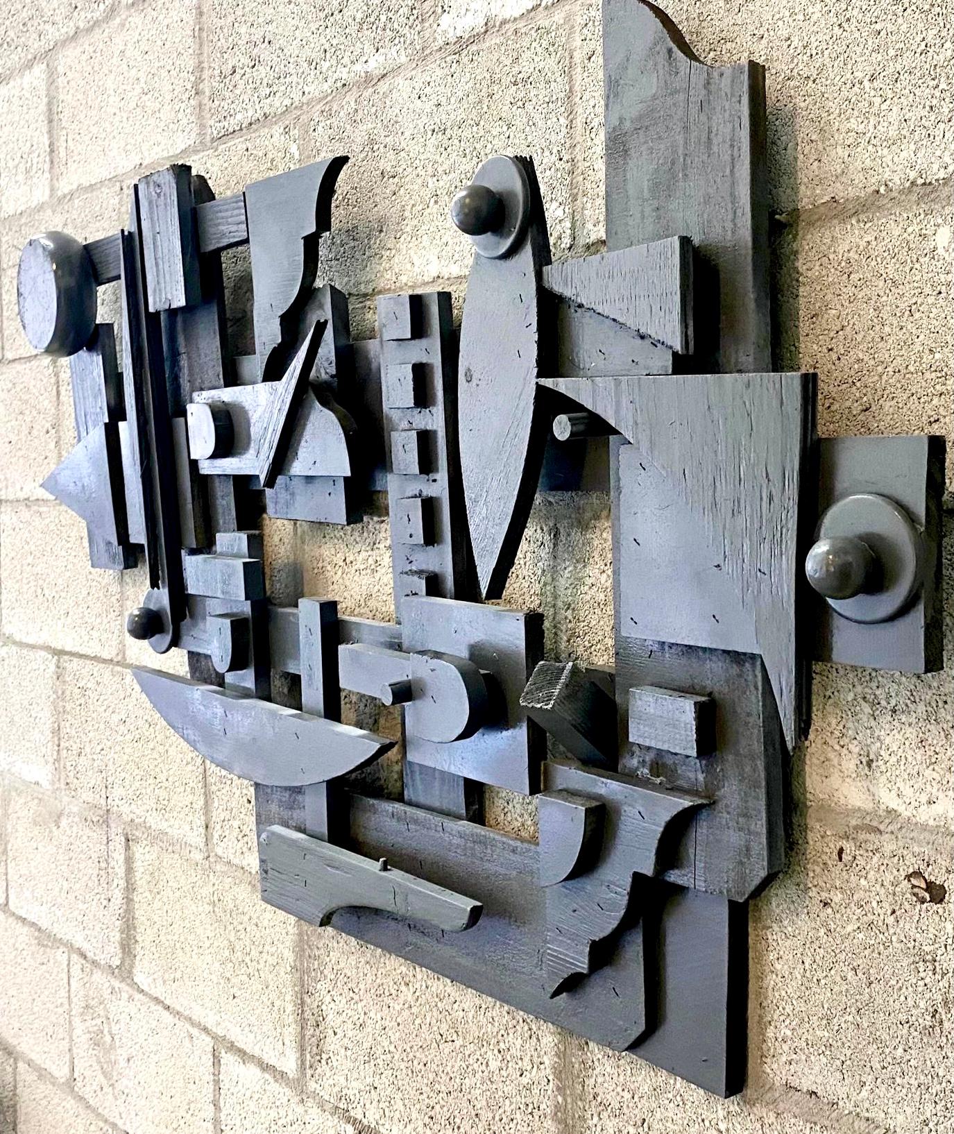 Amazing contemporary wall sculpture. Beautiful found object style using different shapes of wood. Monumental in size and presence. Signed by the artist Galiotto. Acquired from a Palm Beach estate.