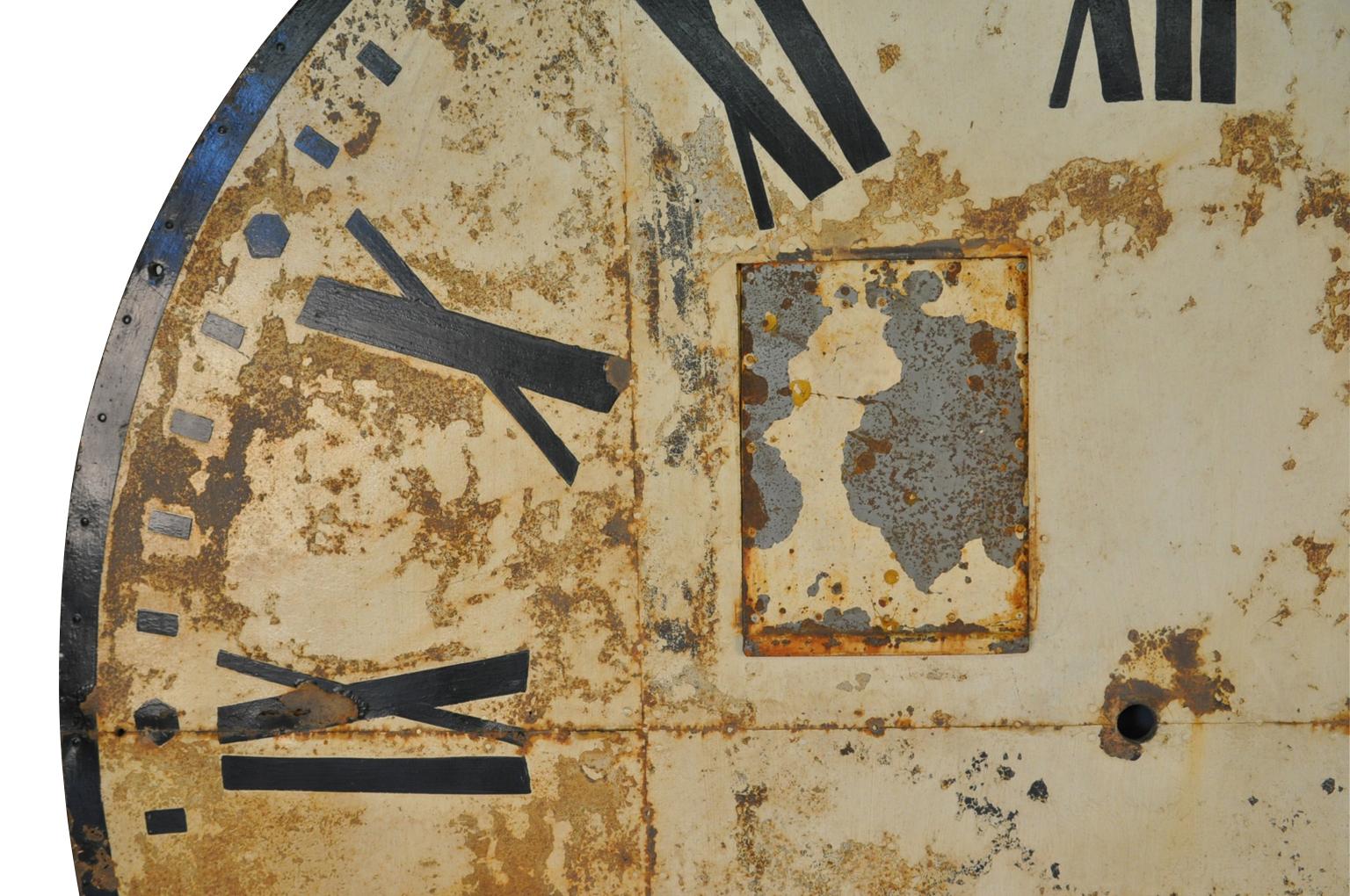 A monumental later 19th century town hall clock face from the South of France in painted metal. Fabulous as wall-mounted artwork or as a terrific headboard.