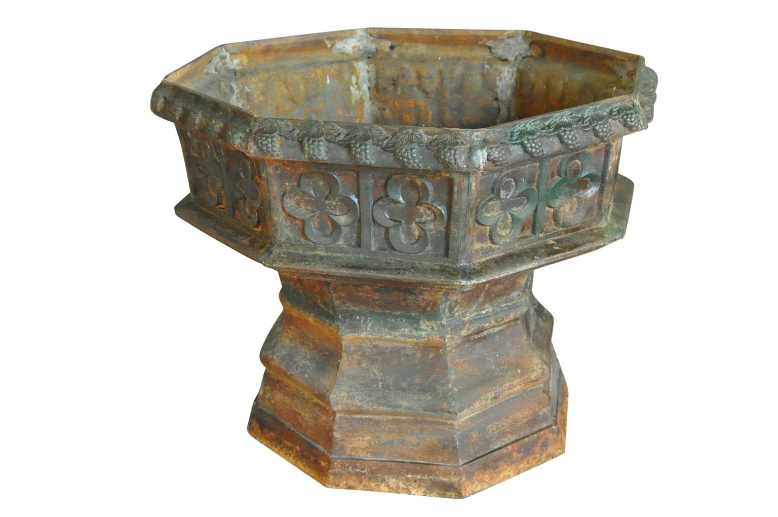 A monumental and fabulous jardinière from the South of France. Soundly crafted from cast iron with a wonderful grape bunch motif. Not only fabulous as a jardinière or planter, but would serve beautifully as a fountain base or as a base to a table.