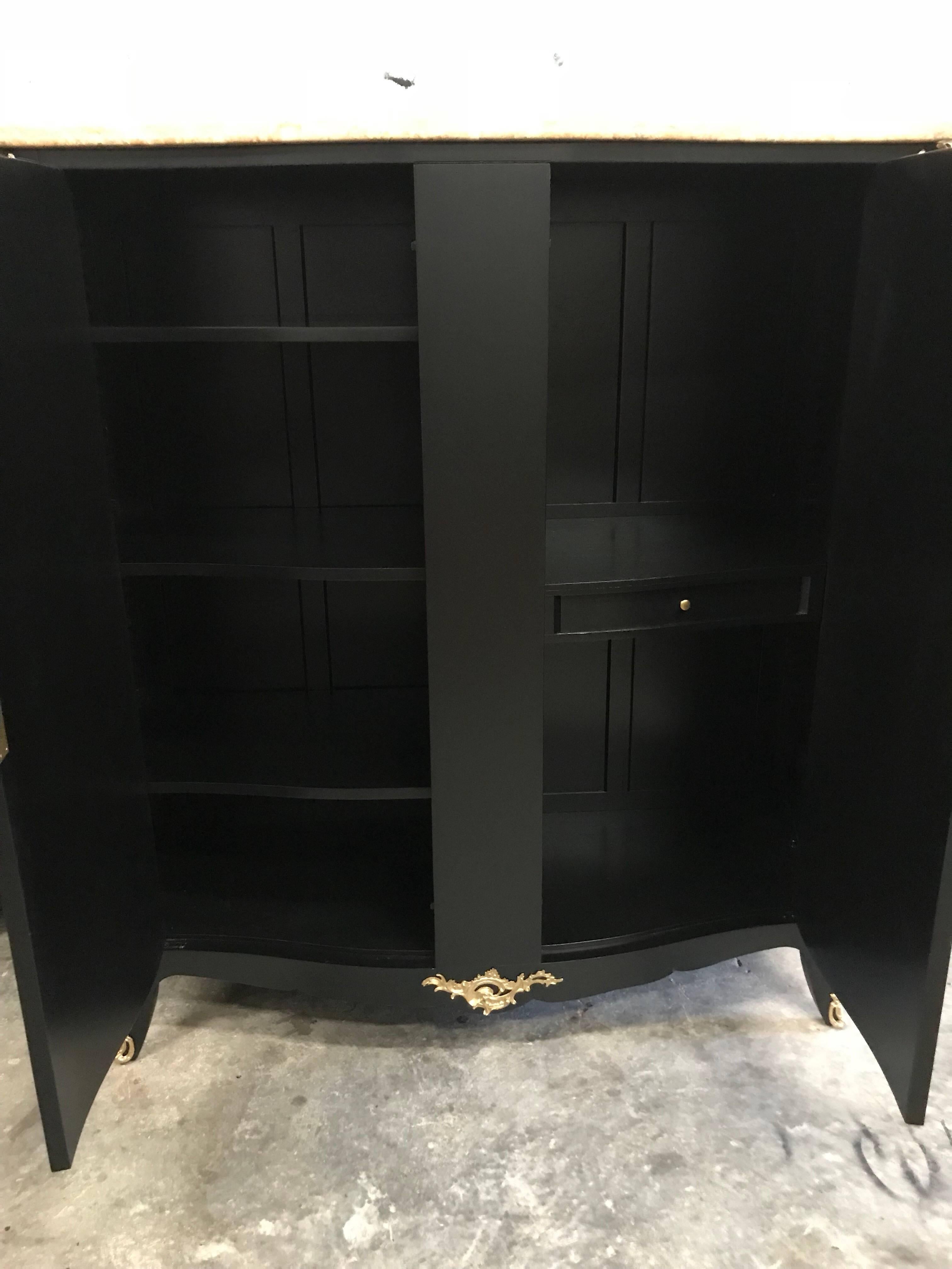 Monumental French Art Deco ebonized dry bar or cabinet with marble top, with all shelves adjustable and we have extra shelves for the bar. The bar are beautiful with bronze hardware detail, and the beautiful color of the marble top ,Newly lacquered