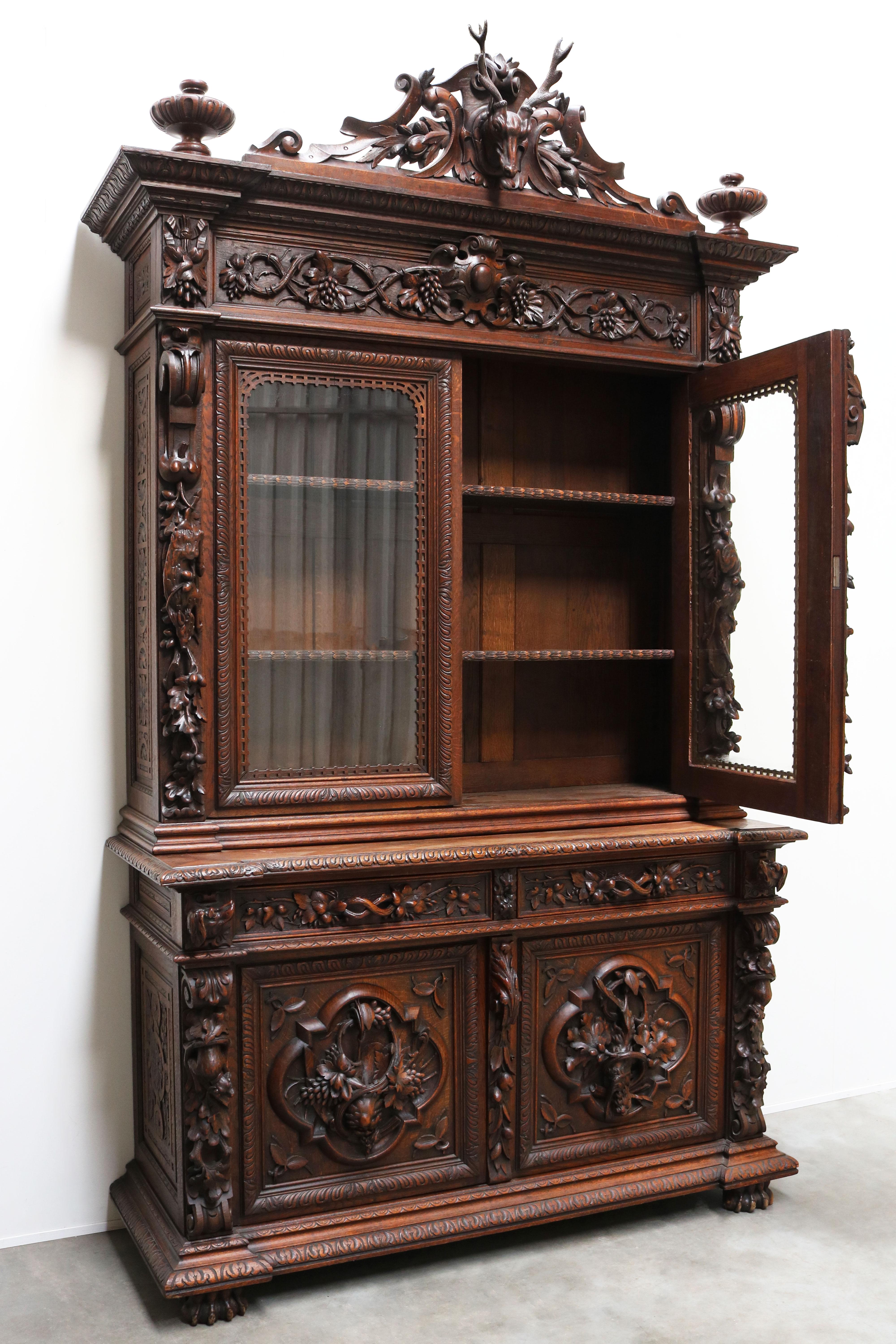 Exquisite & Breathtaking! This rare monumental 19th century French hunt style / renaissance revival Cabinet of exceptional quality. 
The cabinet is richly decorated with French hunt / Black Forest style carvings of numerous animals & floral