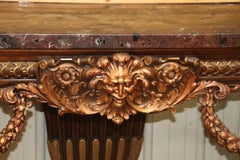 Monumental French Northwind Masque Gilded Walnut Marble Top Console Table