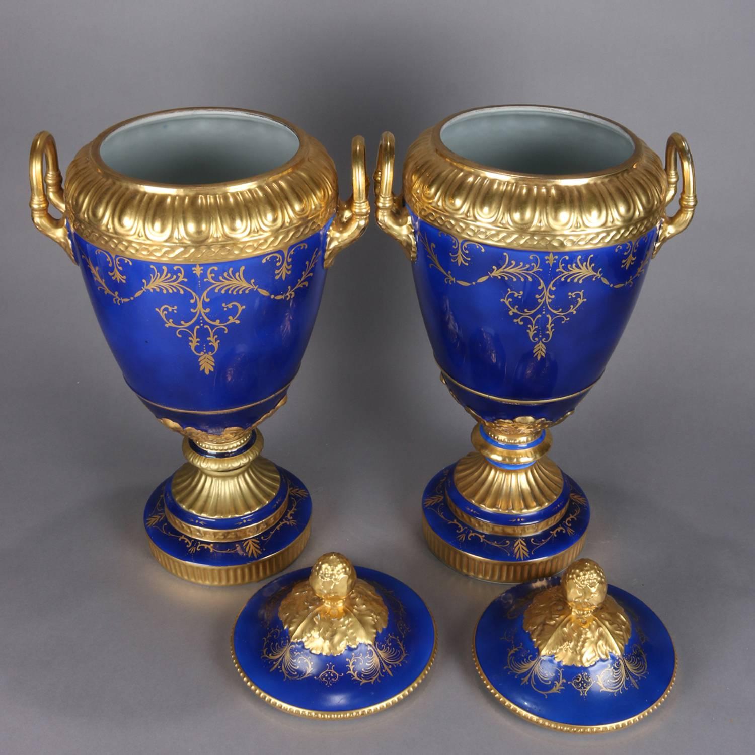 Monumental French Sevres School Hand-Painted Cobalt and Gilt Porcelain Urns In Fair Condition In Big Flats, NY