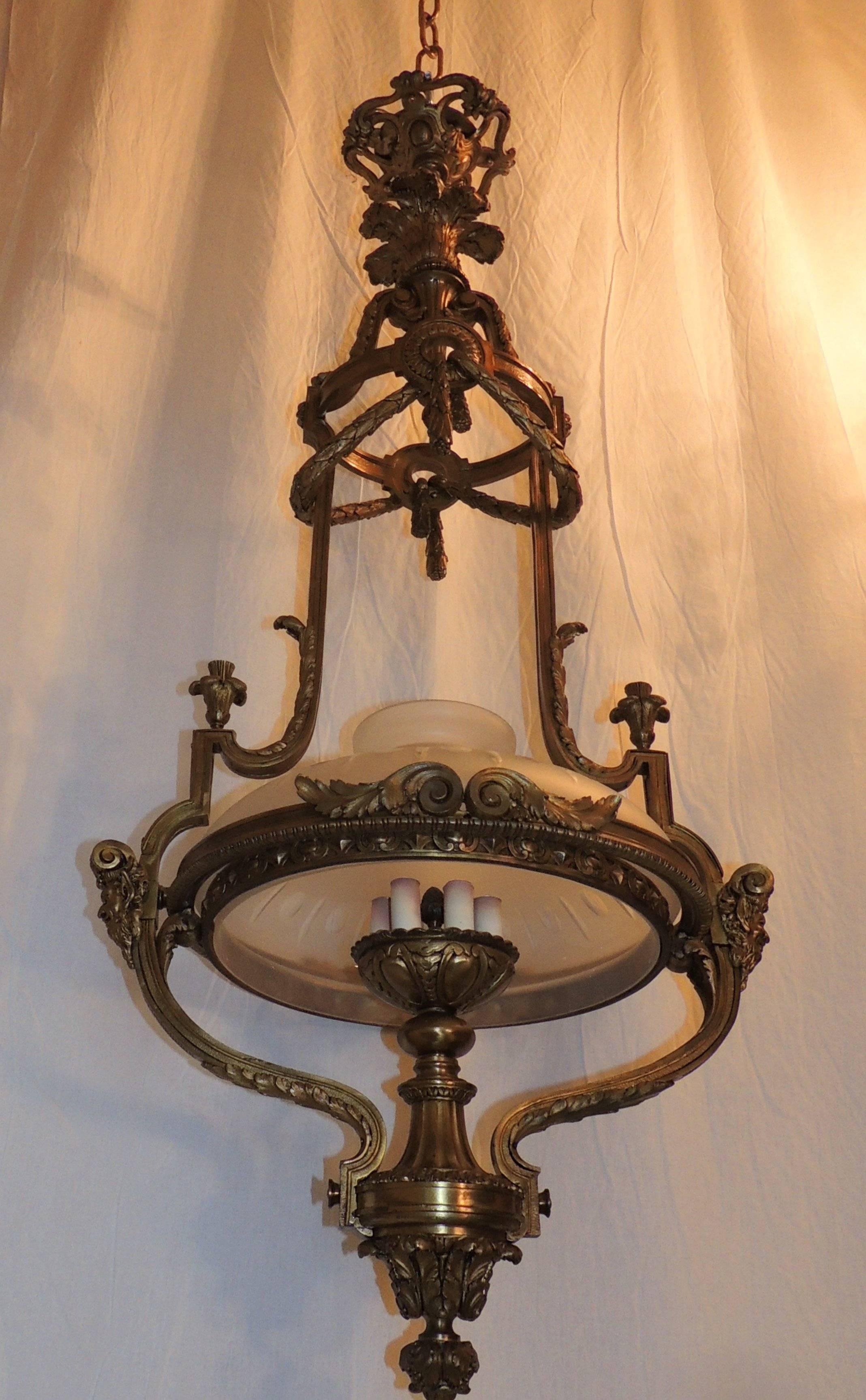 Monumental French Victorian gilt bronze frosted globe chandelier fixture lantern.

Measures: 50