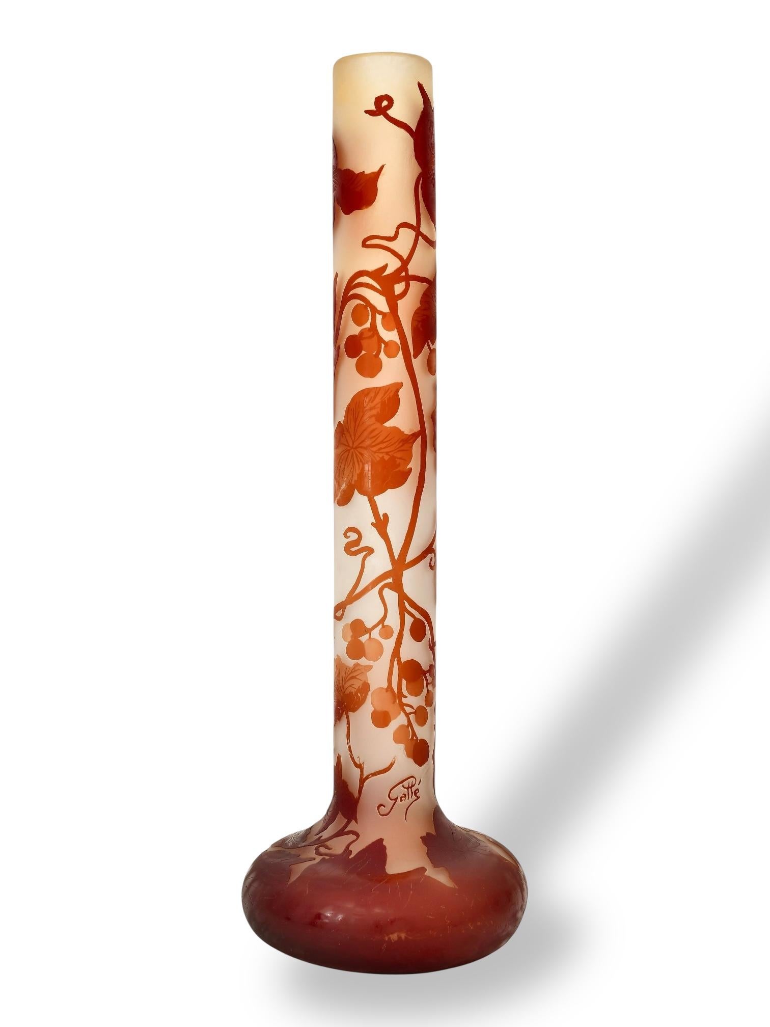 Monumental ruby red cameo glass vase by Email Galle (1846-1904) measuring 30 inches tall and 9 3/4 inches in diameter.