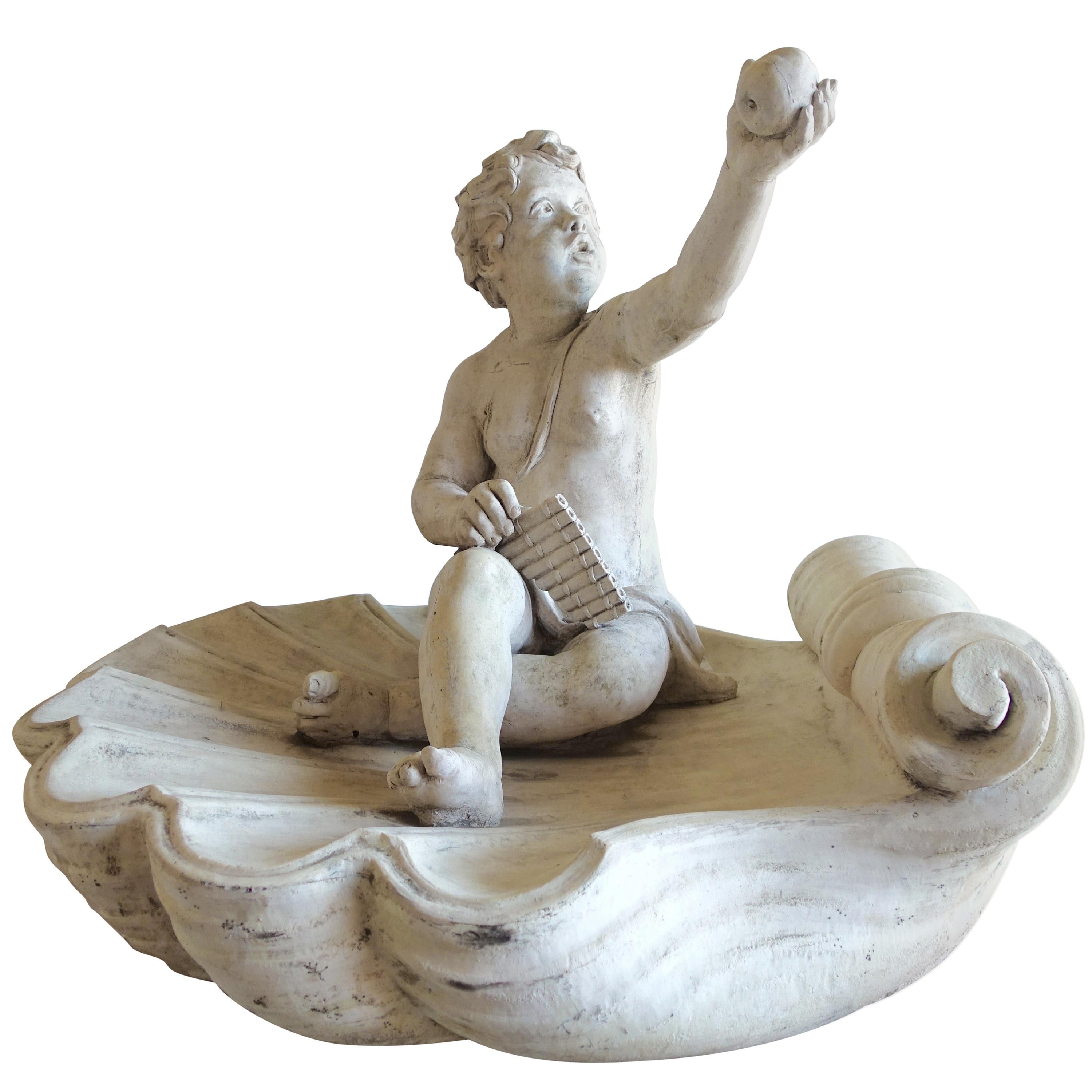 Monumental Garden Cherub Sitting on Large Shell with Apple