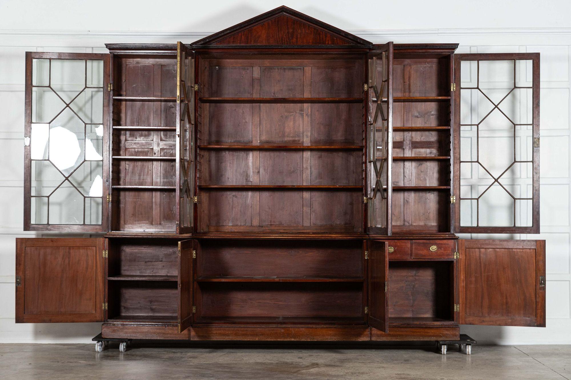 circa 1800
Monumental George III English Mahogany Breakfront Library Bookcase

An exceptional example
sku 2062
Together W280 x D46 x H266 cm
Base W280 x D46 x H82 cm
Base internal shelf depth 42 cm
Top W283 x D37.5 x H184 cm
Top internal shelf depth
