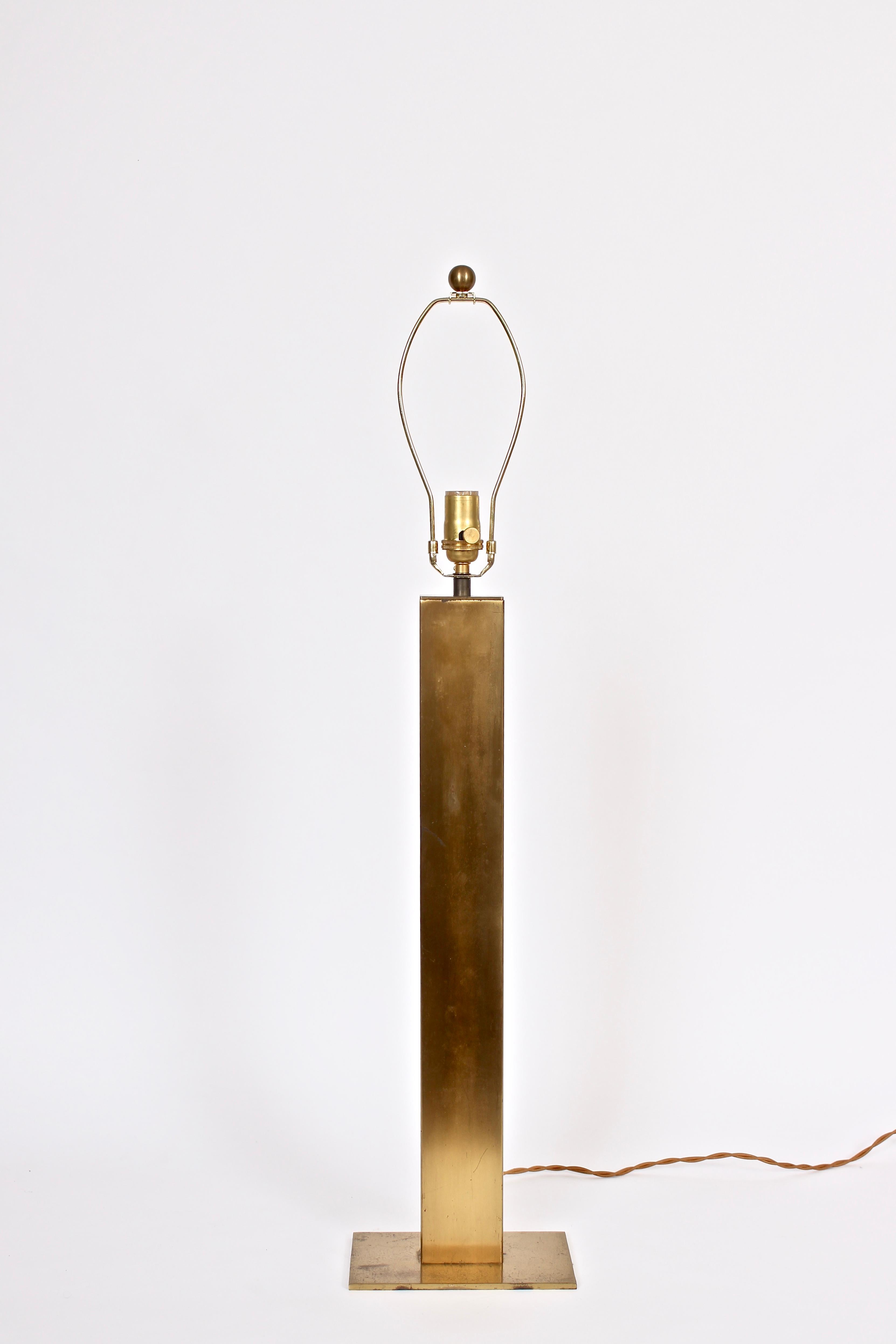 Tall George Kovacs Brass Tower Table Lamp. Featuring a three foot high rectangular, reflective, heavy brass plated column on rectangular base. Substantial with small footprint. Shade shown for display only (9H x 11D top x 16.5 D bottom). 28H to top