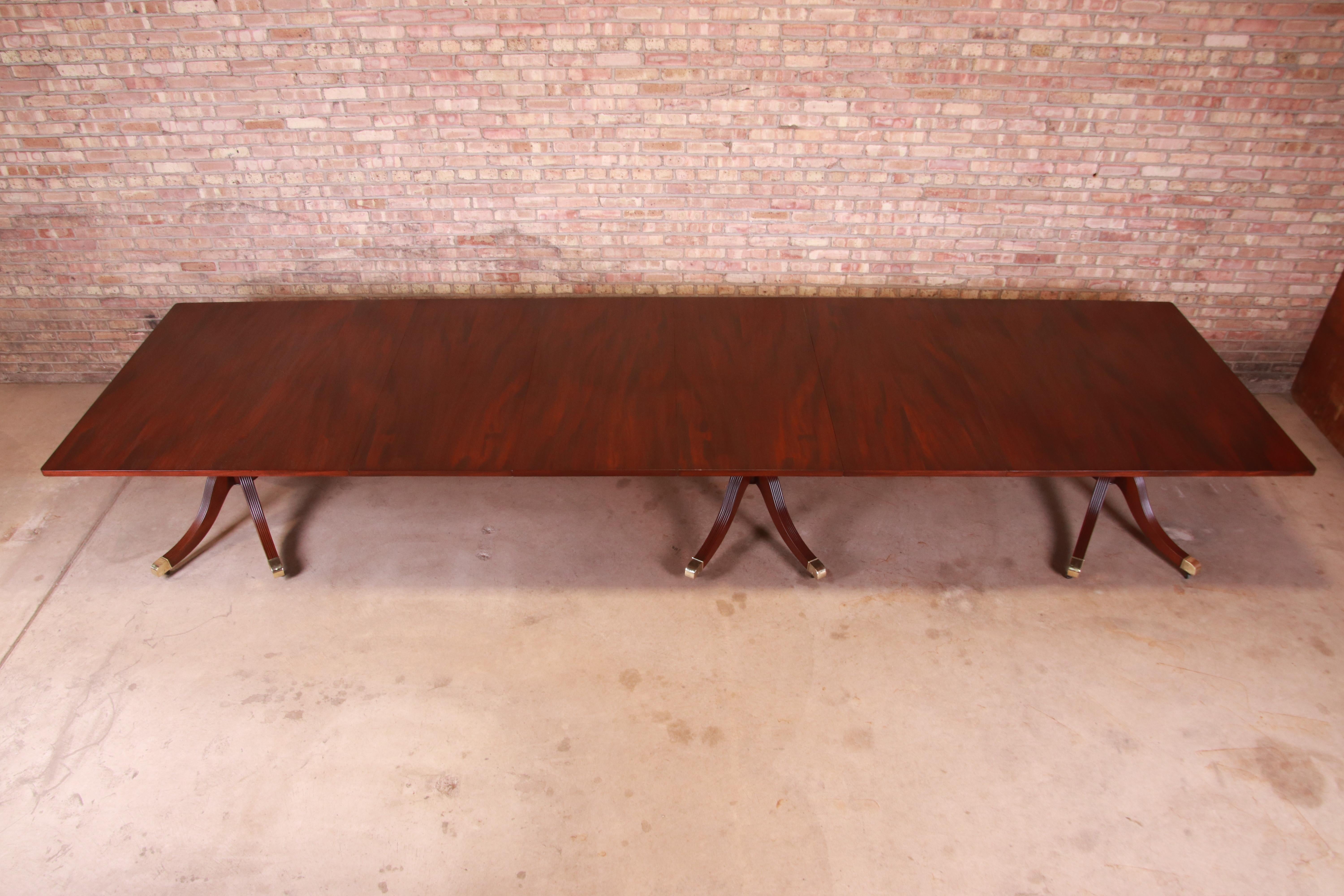 20th Century Monumental Georgian Mahogany Triple Pedestal Dining or Banquet Table, Refinished