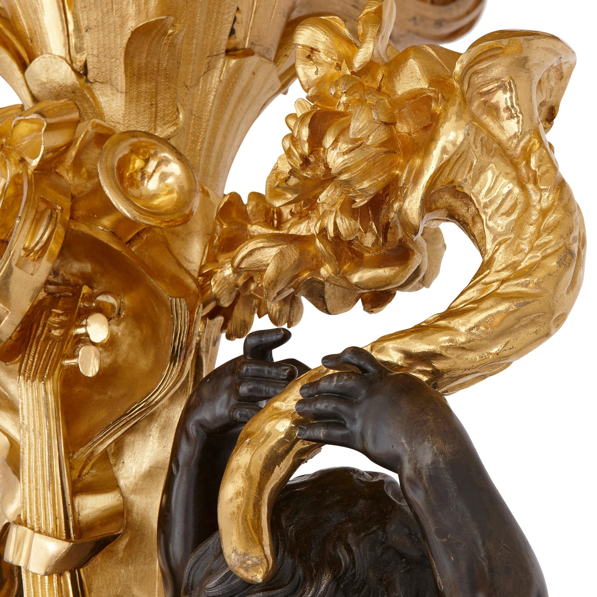 Monumental candélabre en bronze doré et patiné de Beurdeley
Français, fin du XIXe siècle
Mesures : Hauteur 273 cm, largeur 90 cm, profondeur 90 cm.

Cette paire de candélabres monumentale et opulente de Beurdeley témoigne du talent artistique et
