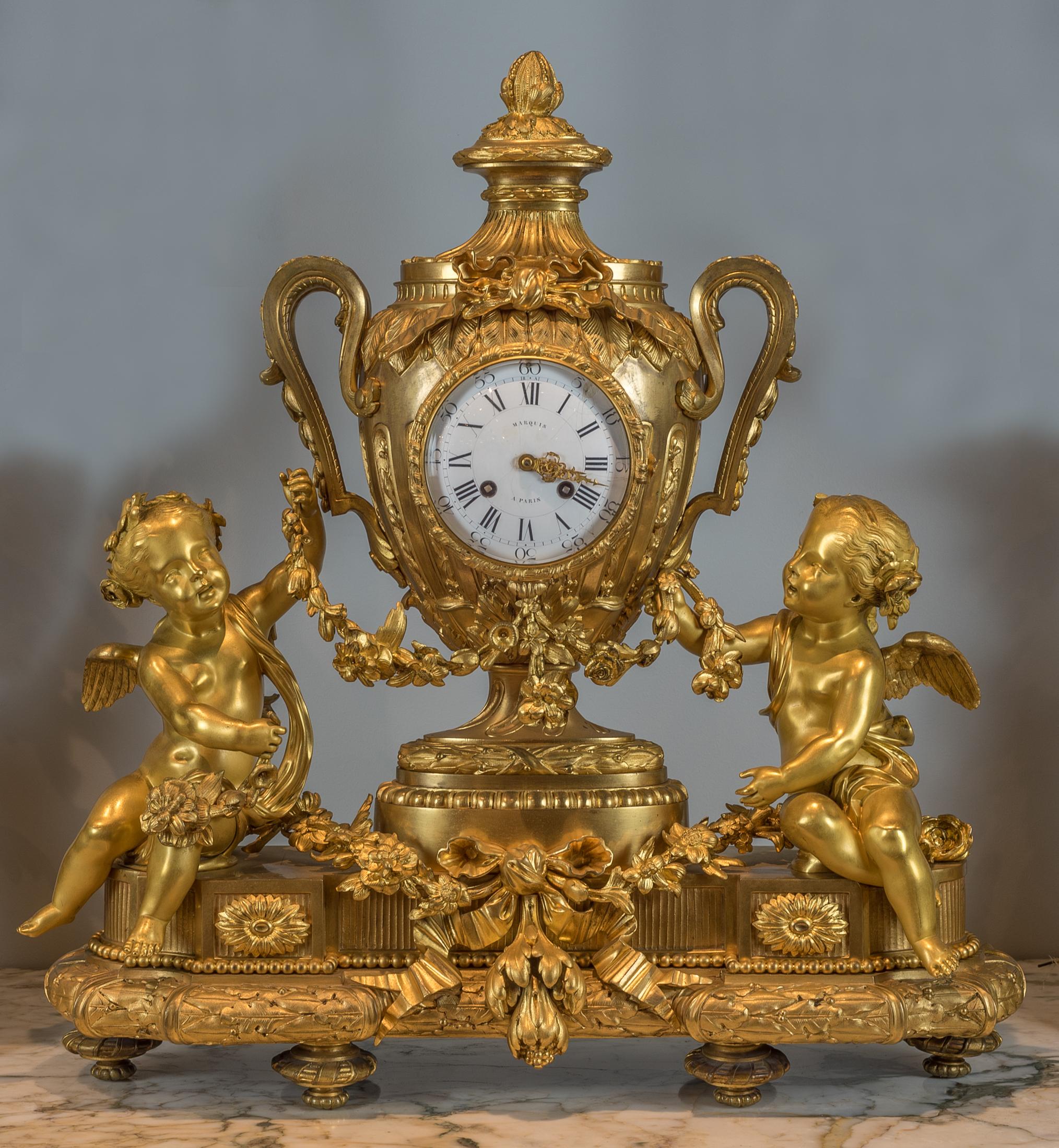 The enamel dial signed ‘Marquis à Paris’ standing on oval base with exceptionally elaborate decoration all over.

Origin: French
Date: 19th century
Dimension: (Clock) 27 inches high; (candelabra) 35 in x 17.5 in.