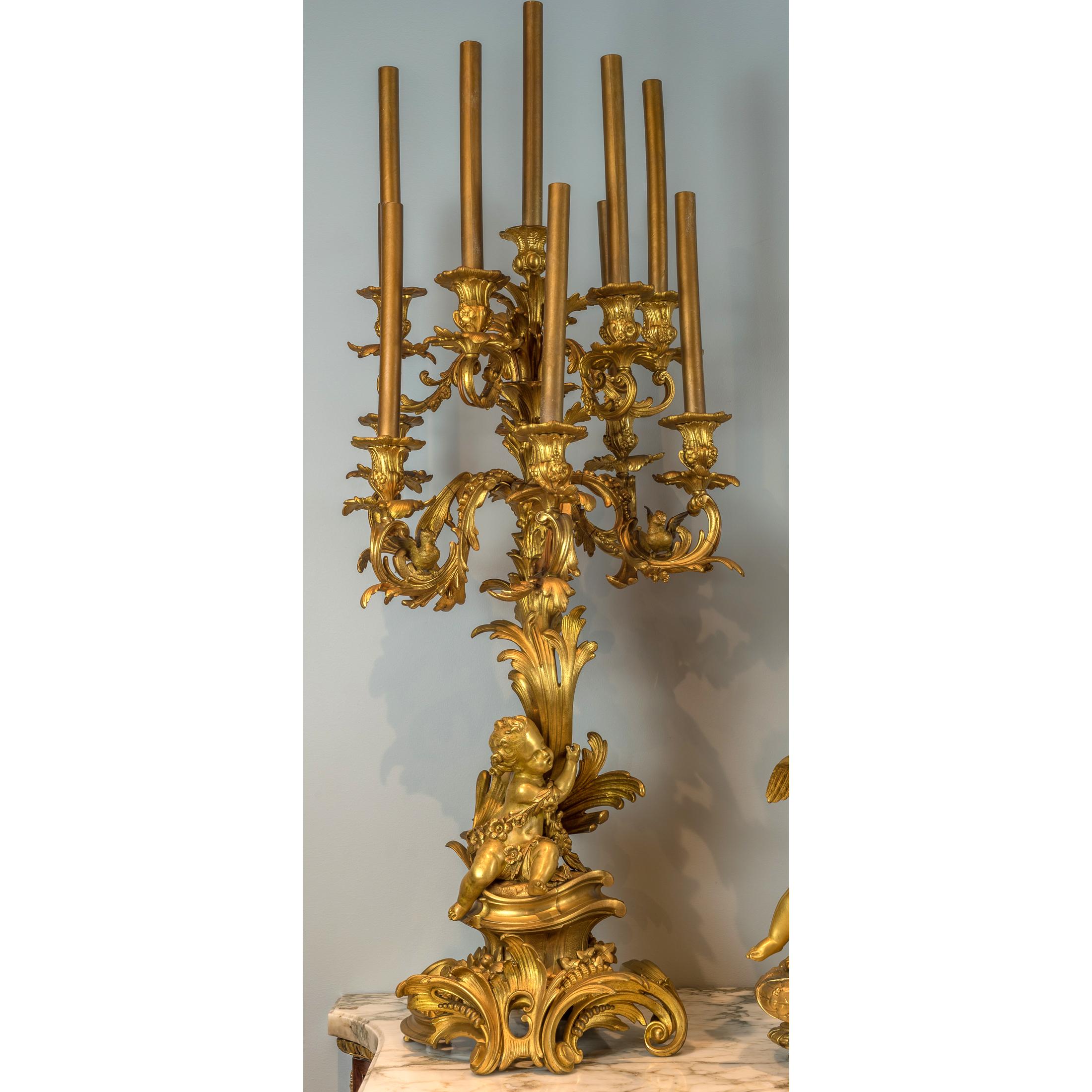 French Monumental Gilt Bronze Clockset with Putti Playing with Flower Garlands For Sale