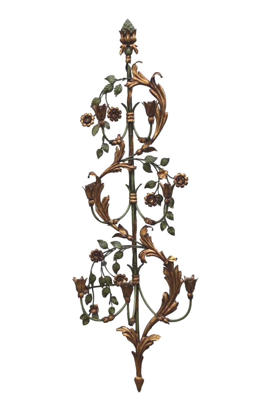 Add a touch of opulence to your home with this charming monumental sconce. Perfect gilt metal leafs on green rods with leafs, to enhance any chic or eclectic home. We'd love to see it hanging in an entryway as a charming welcome home. Built in the