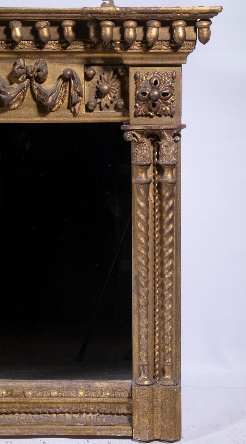 A truly, exceptional and most fine example of the neoclassical mastery. This monumental mirror will make a truly shows-stopping statement  in any parlor it is displayed. 

Very formal, robustly carved swags, acorns, festoons, columns, Laurel swags,