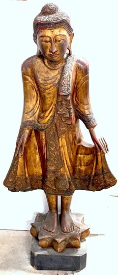 Monumental Giltwood Standing Buddha with Lotus Base, Burma, Late 19th Century