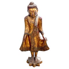 Monumental Giltwood Standing Buddha with Lotus Base, Burma, Late 19th Century