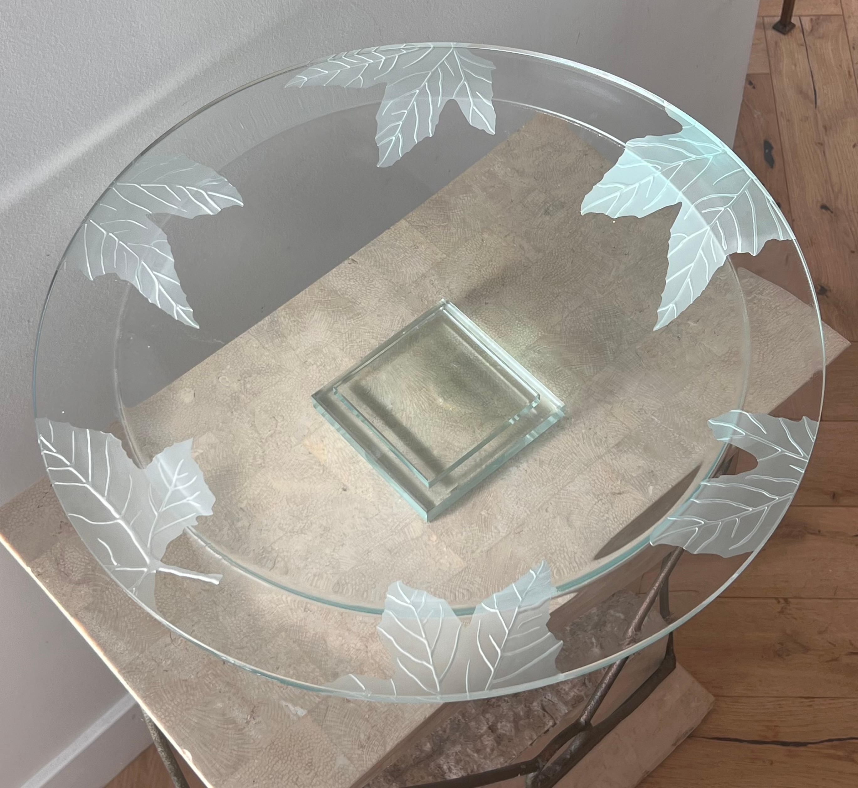 A huge, monumental studio art glass centerpiece platter with etched leaves by Stephen Schlanser, 21st century. A large thick glass dish is etched with an intricate leaf motif, and layered upon geometrically intriguing stacked glass blocks. It is