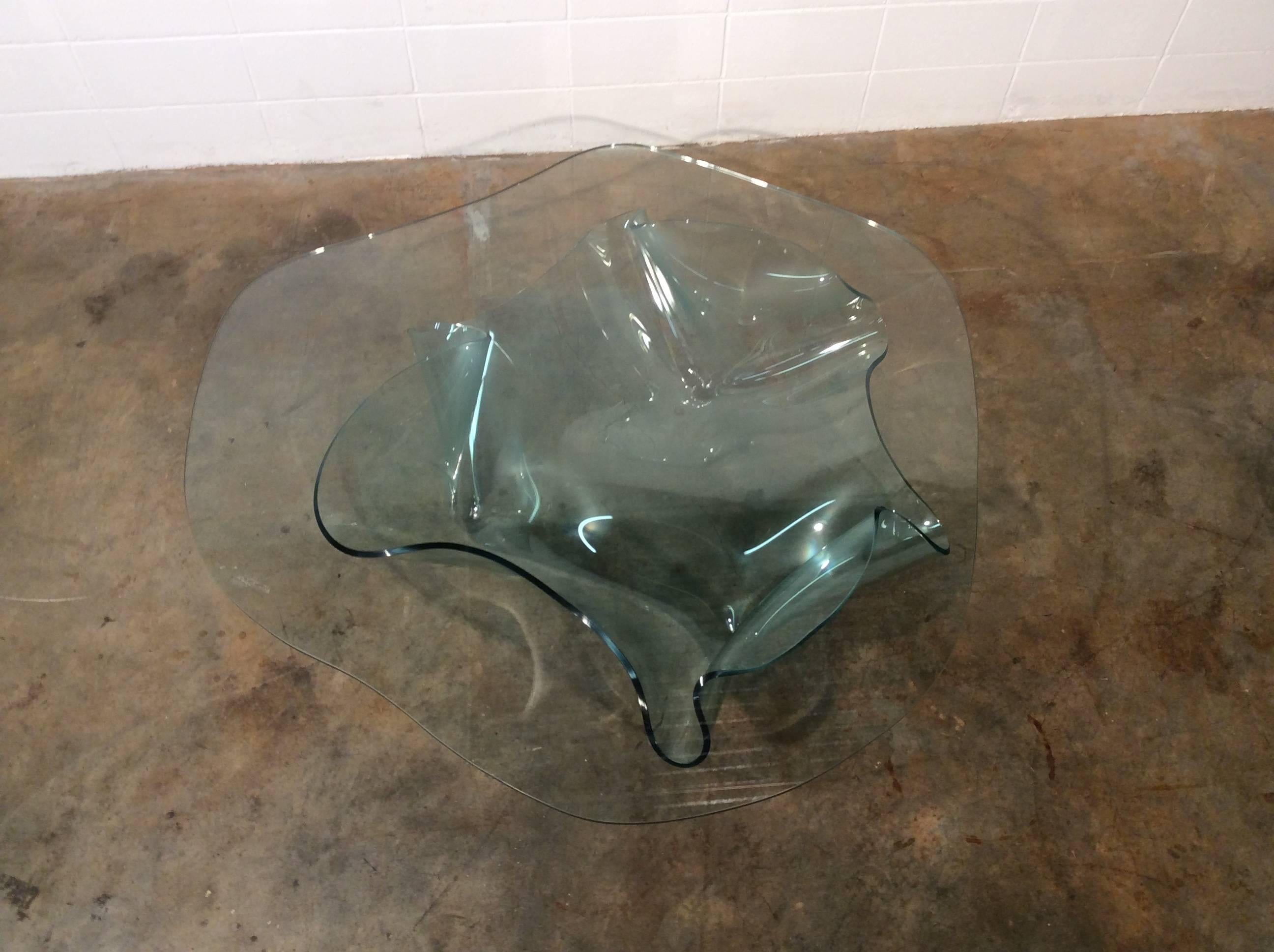Monumental glass coffee table by The Late Laurel Fyfe, stunning designer item. Signed / dated / numbered
The late Laurel Fyfe was a widely respected artist and was known for her skills in glass works in the art world as well as well as the