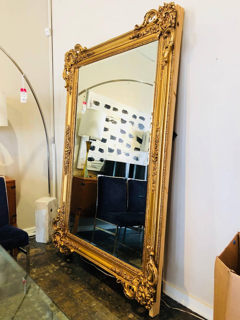 Monumental Gold Craved Framed Beveled Mirror at 1stDibs