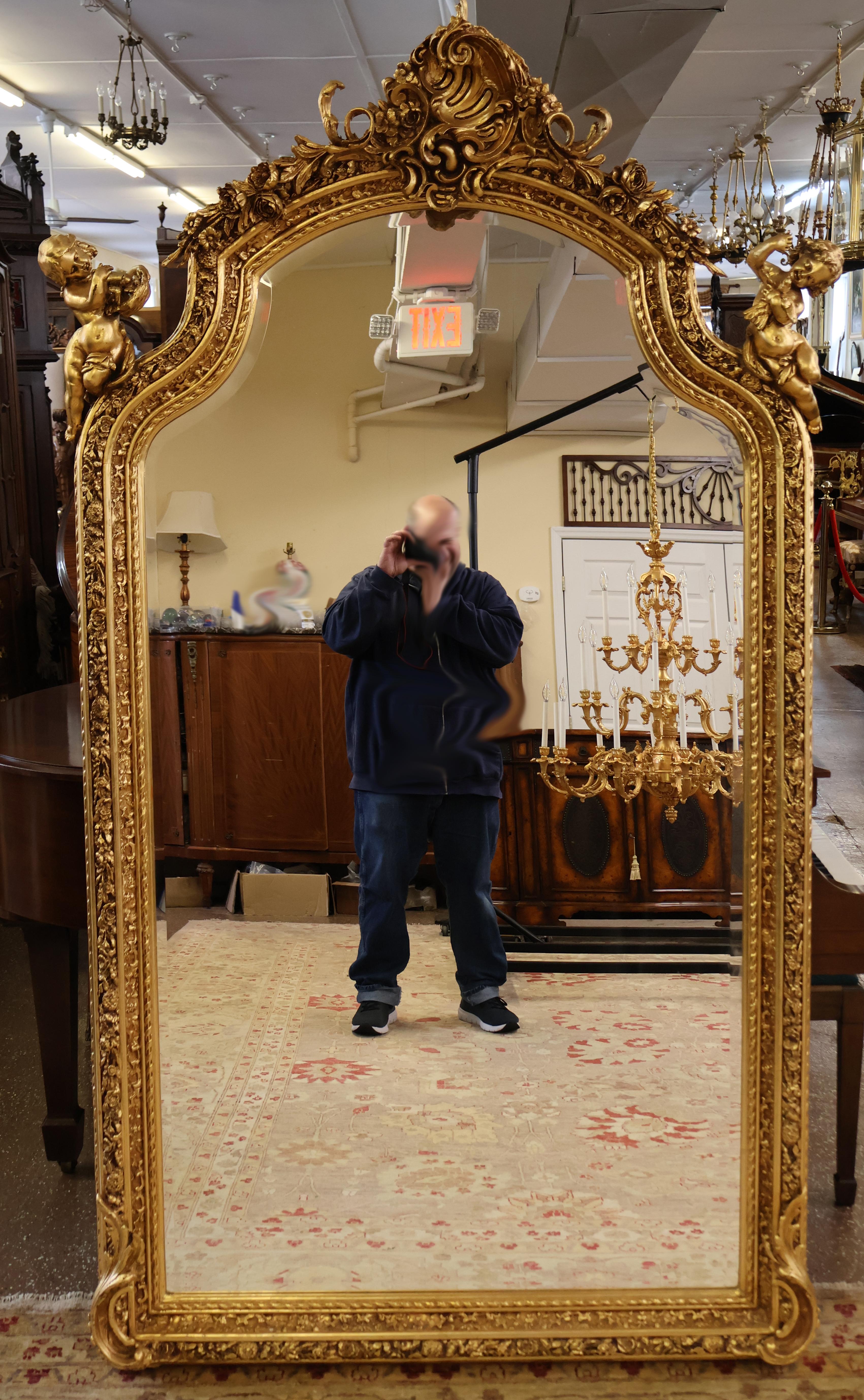 Inconnu Miroir biseauté Monumental Gold Louis XVI French Style Cherub Putti Motif 7' Tall en vente