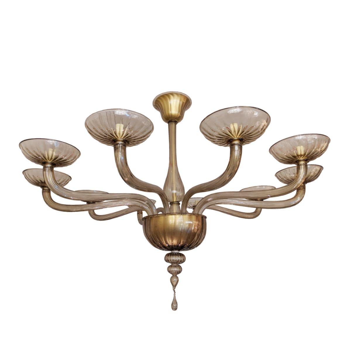 A very large and elegant Italian chandelier. Beautiful golden Murano glass color and newly rewired.
 