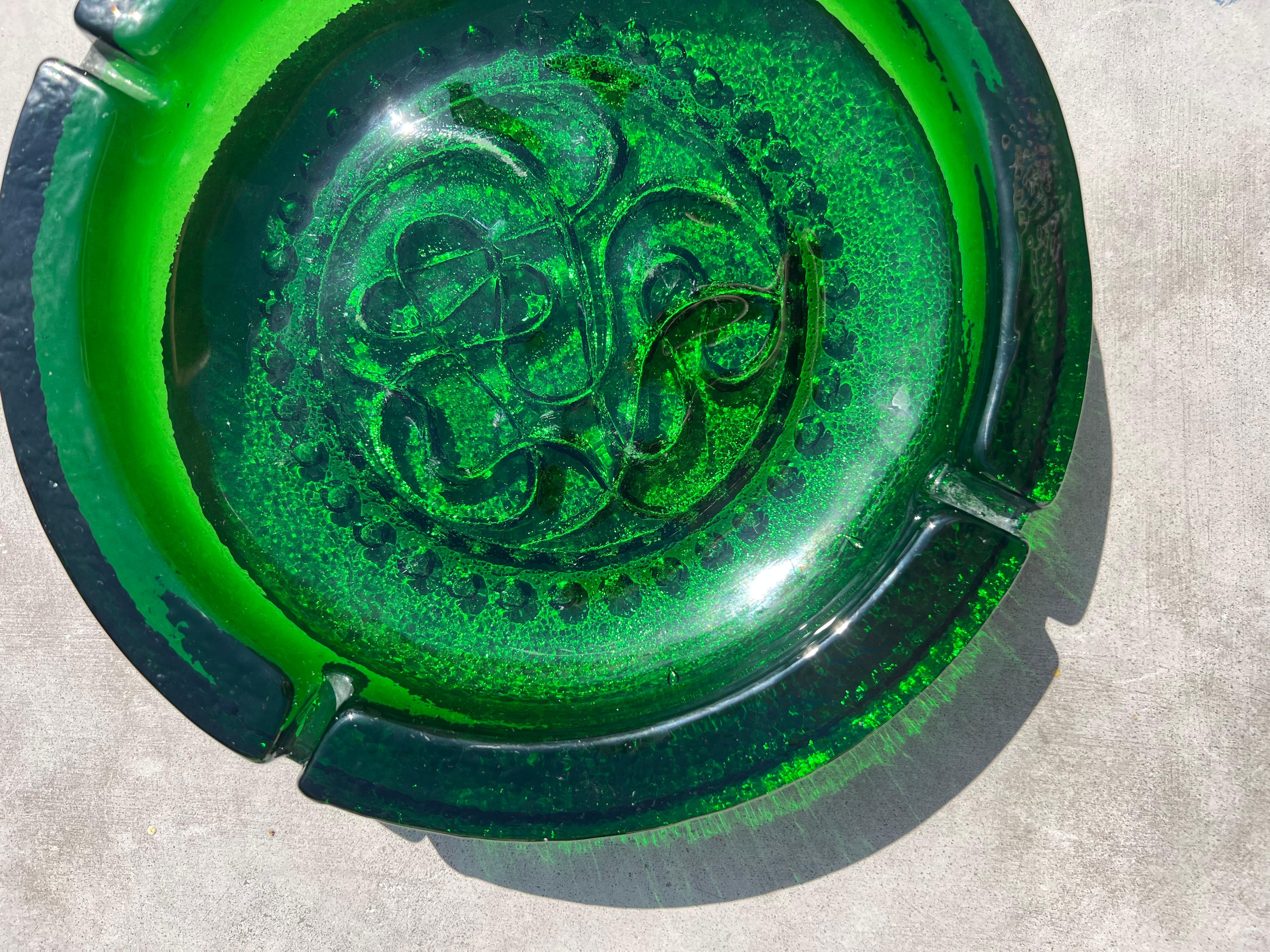 green glass ashtray