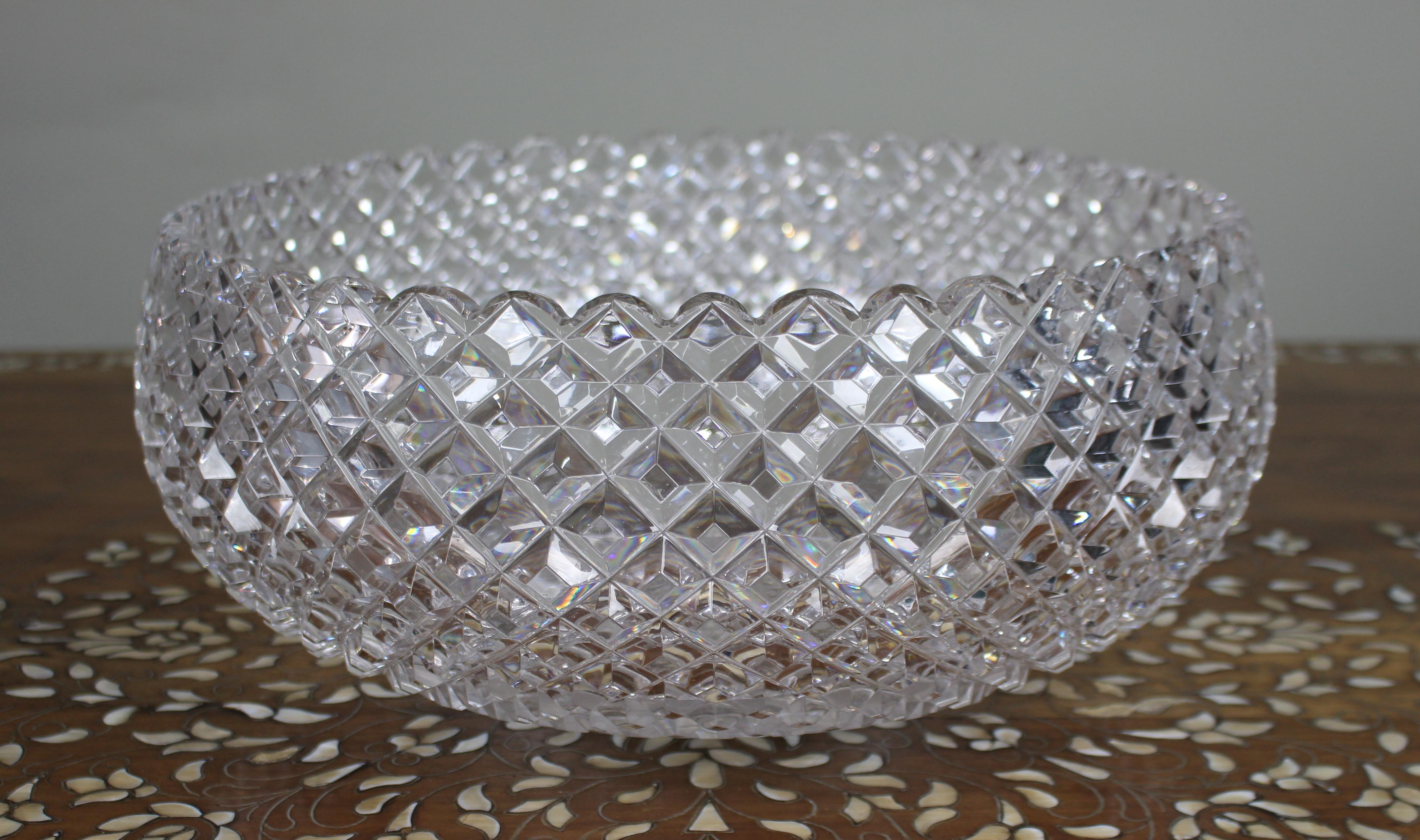 Monumental Hand-Cut Crystal Centrepiece Bowl, circa 1935

A magnificent large hand-cut crystal bowl of exceptional clarity and craftsmanship, dating from the inter-war period, circa 1935. This impressive piece is of deep circular form with a finely