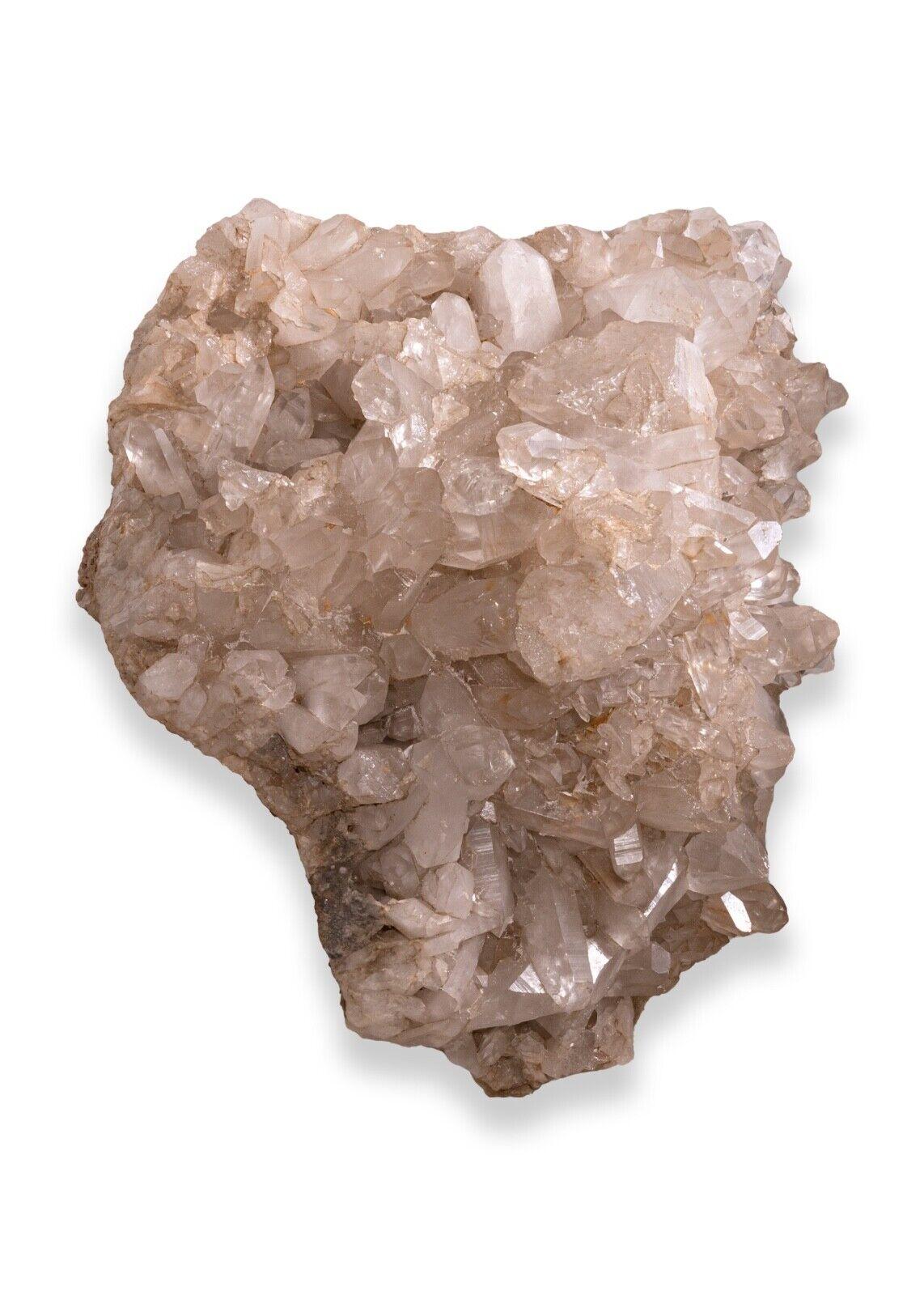 This stunning Monumental Himalayan Quartz Crystal Geode Mineral Specimen is a natural wonder. It is formed when water seeps into cracks in the earth and evaporates, leaving behind a deposit of quartz crystal clusters.This particular geode is from