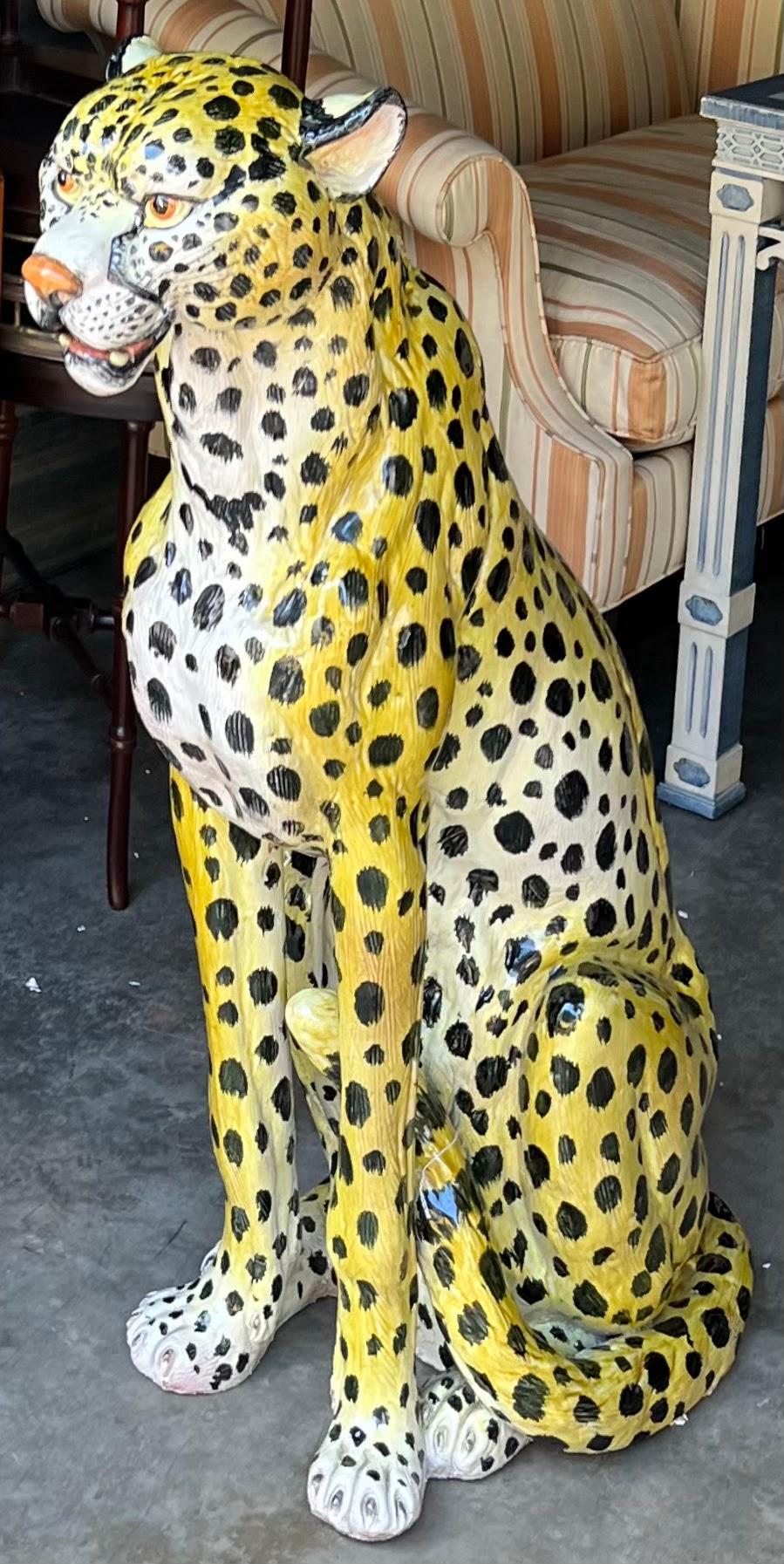 This is a monumental Hollywood Regency Era Italian terracotta leopard figurine. He is huge! This leopard has a wonderful form!

My shipping is for the Continental US only.