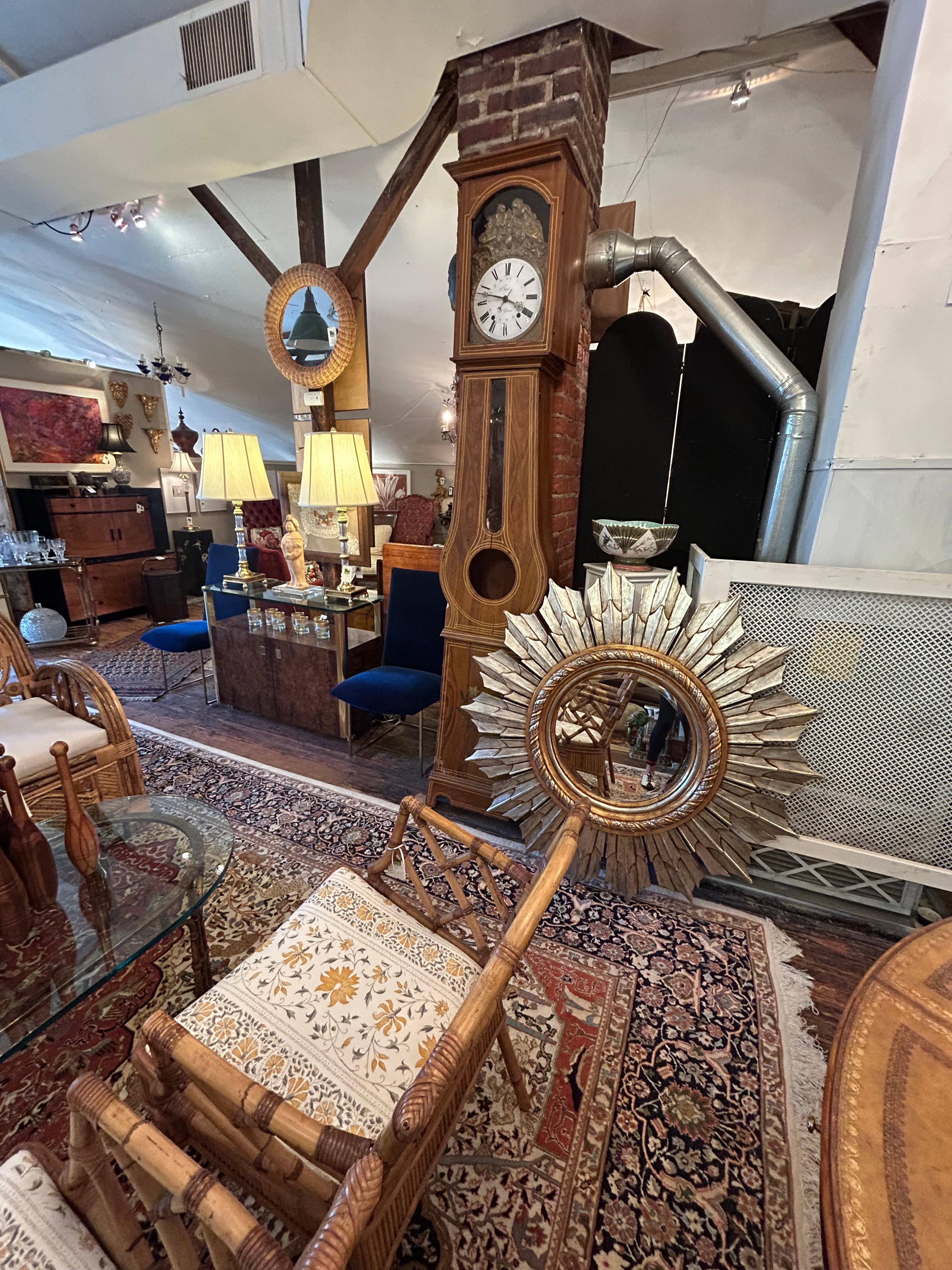 A focal point statement mirror in a super sized scale, intricately carved and gilded in silver and gold, with interior bevelled mirror 18” diameter.
Truly sensational.