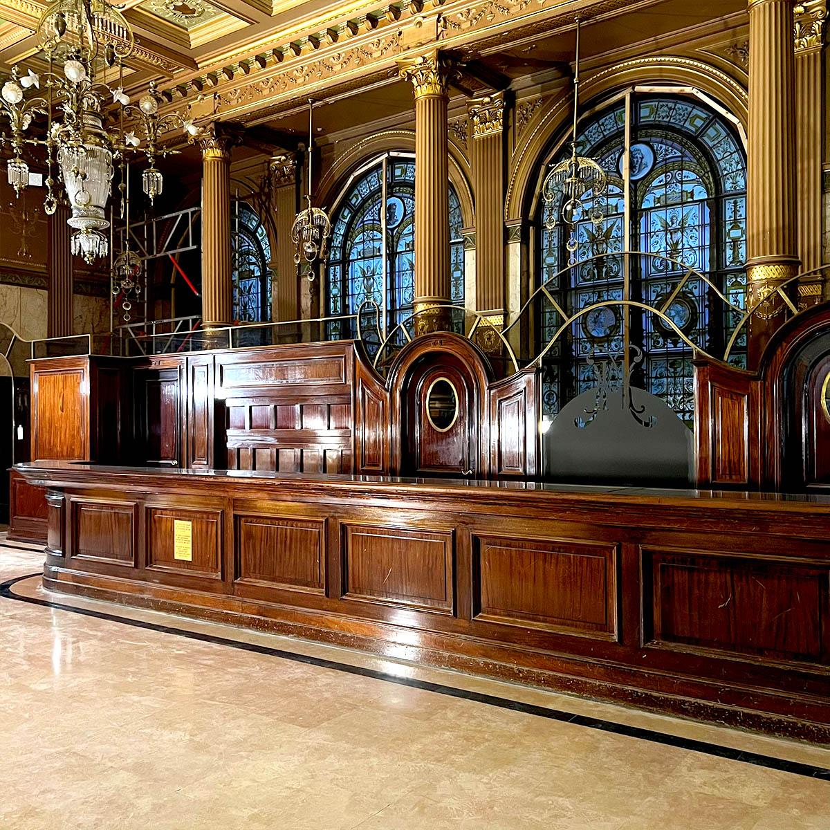 Monumental hotel reception desk set — 11.5m Front Counter, 16.9m Rear

This monumental reception counter, originally part of a grand hôtel palace, is a masterpiece of 20th-century craftsmanship and architectural presence. The counter spans an