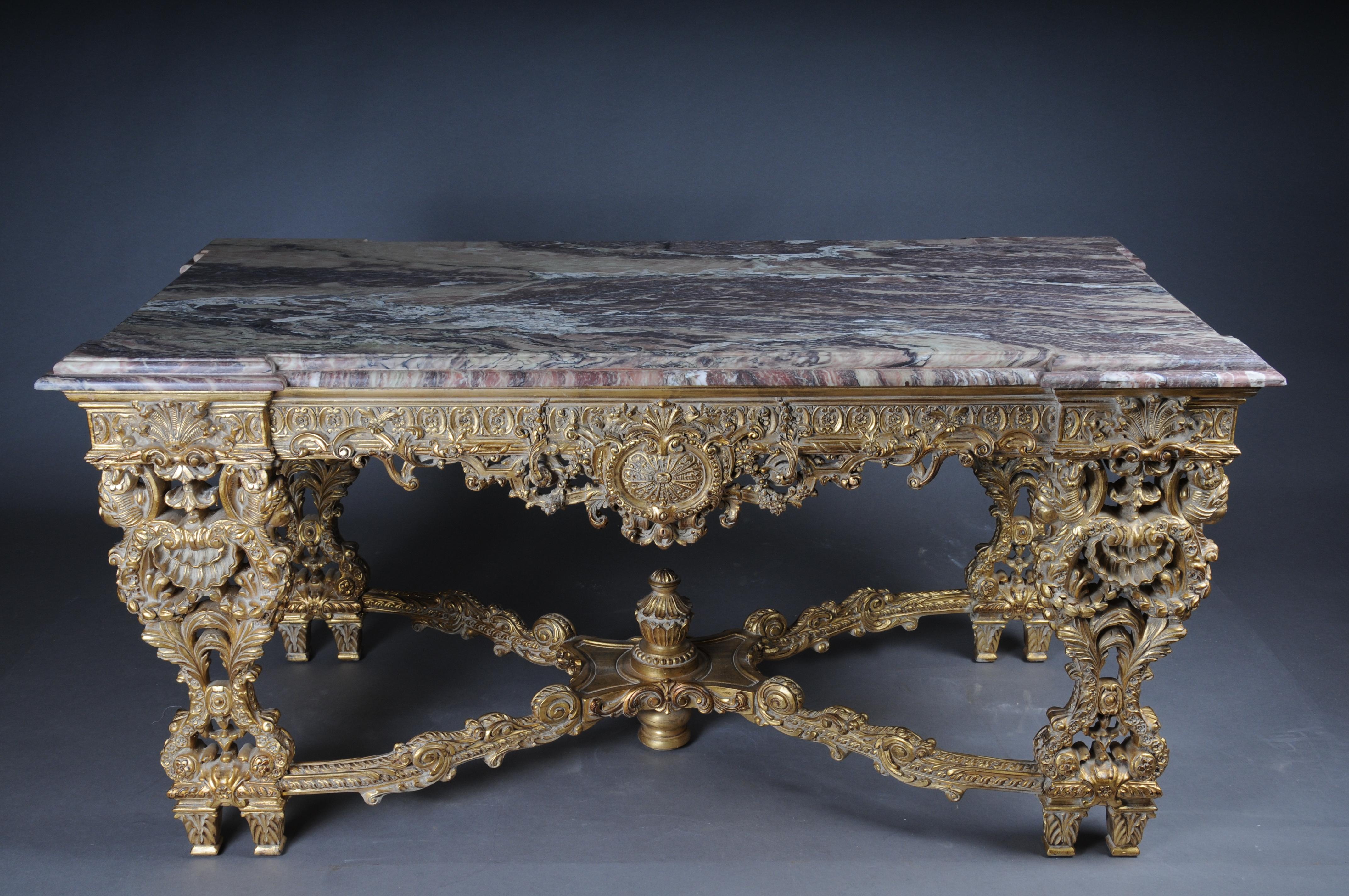 Monumental, Impressive Splendid-Salon-Table after Francois Linke

Monumental, impressive Louis XVI style salon table
High-quality, solid beech wood, carved down to the smallest detail. Very noble and finely gilded. Multiple, carved legs, connected