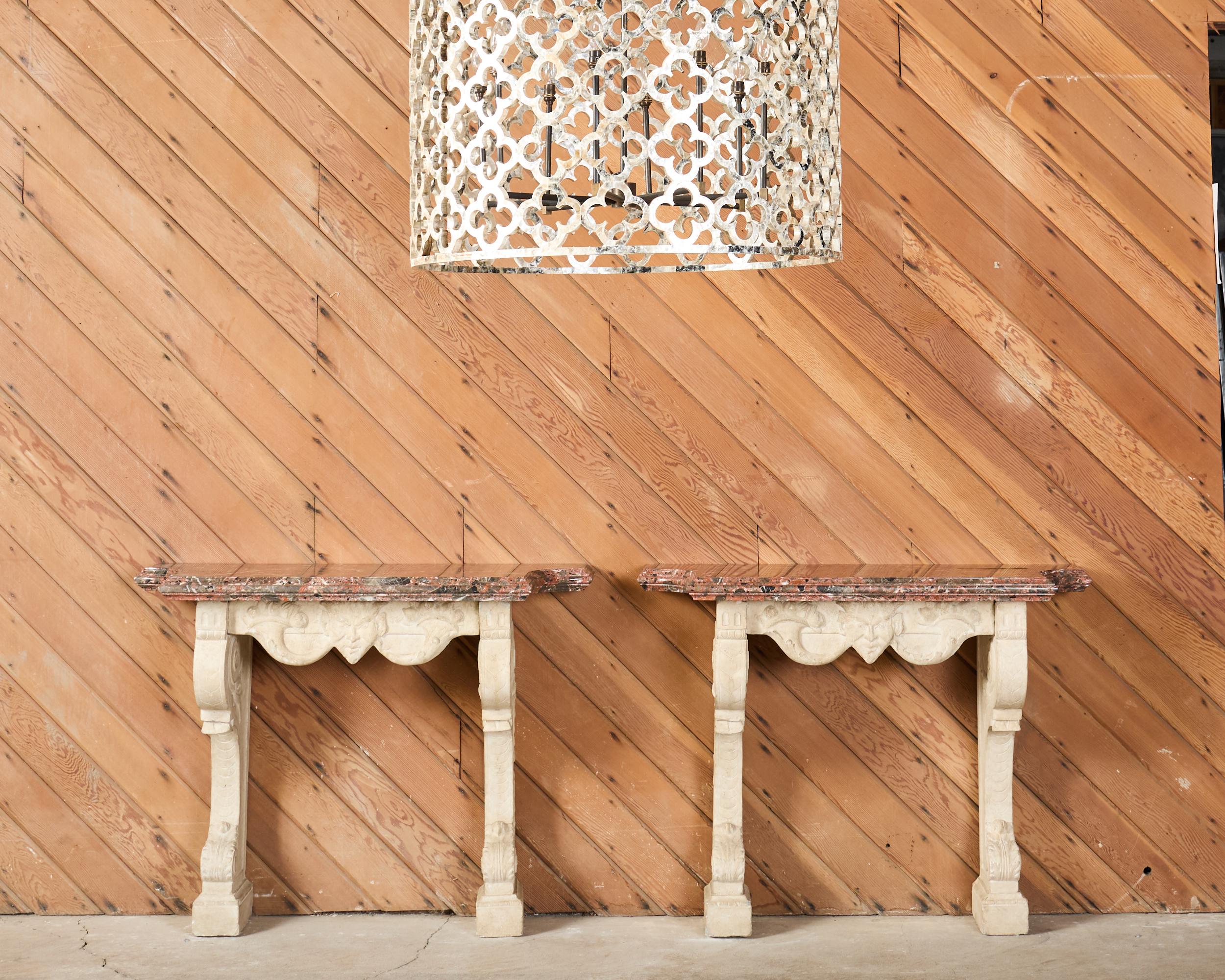 The Asilah chandelier by Ironies features a monumental drum form decorated with neoclassical quatrefoil designs. The chandelier is completely embellished with natural capriz shell veneer having a dramatic pearlescent finish. The open fretwork of
