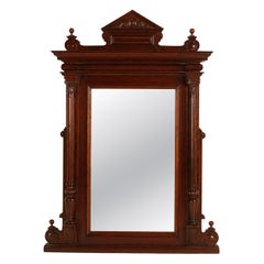 Monumental 19th-Century Italian Carved Walnut Mirror with Architectural Pediment